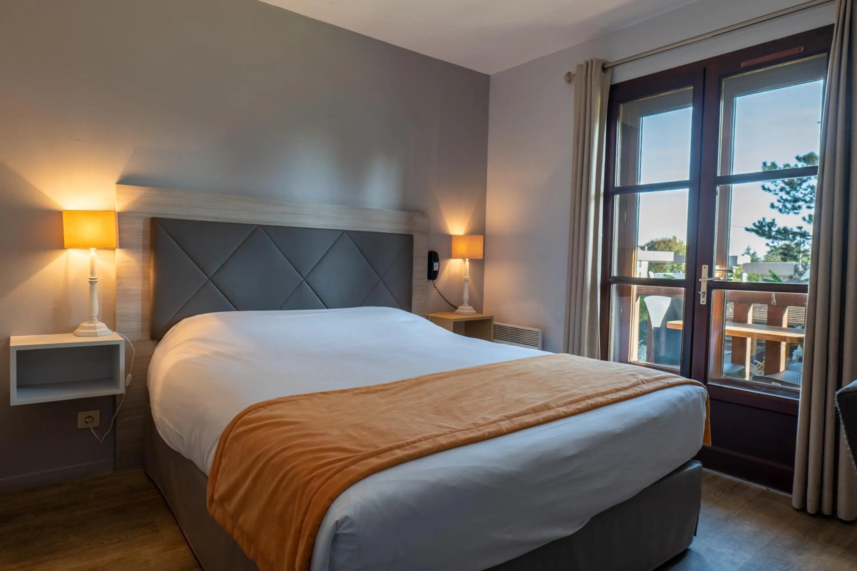 Bed in Hotel Village Motel