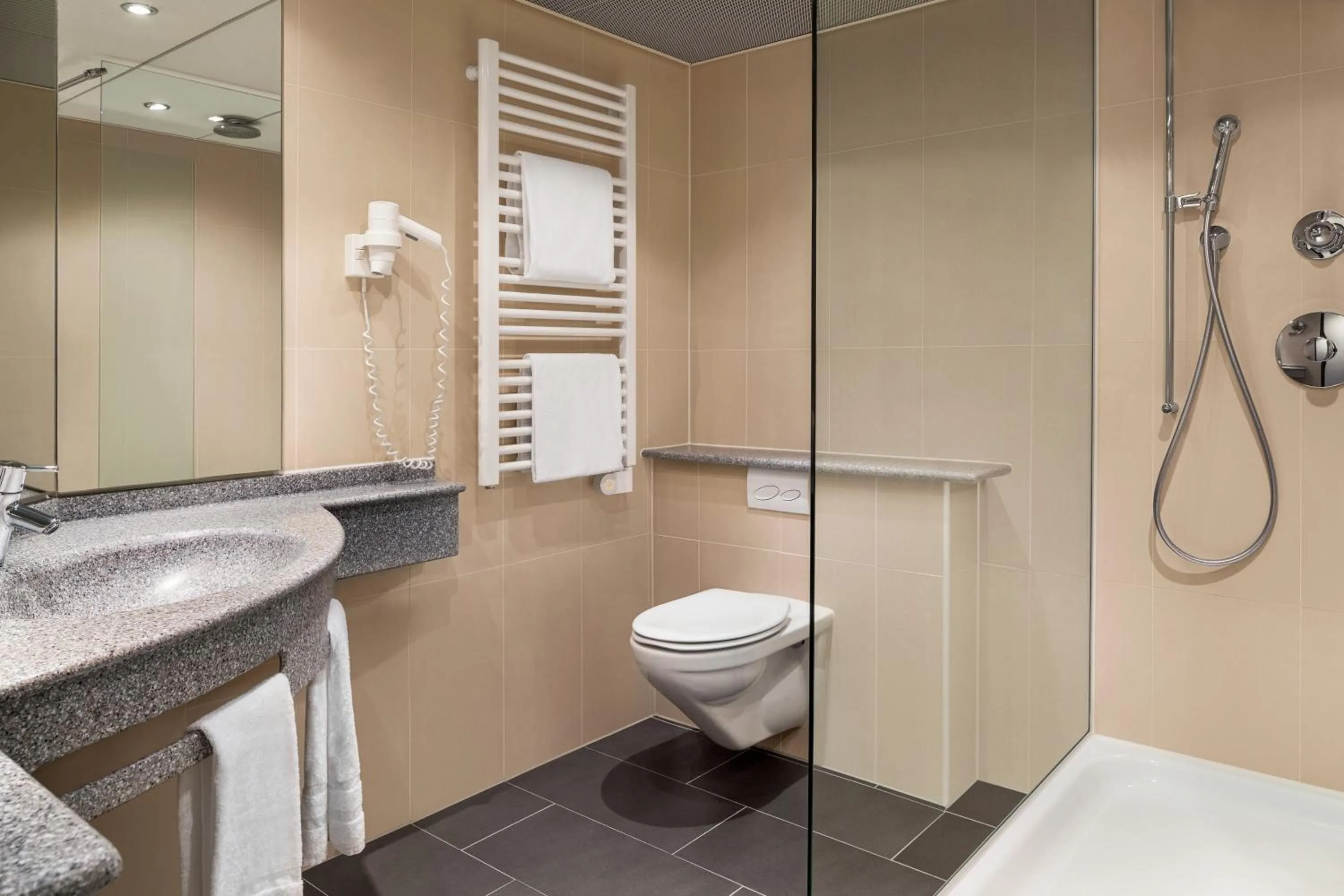 Shower in Ramada by Wyndham Baden Hotel du Parc