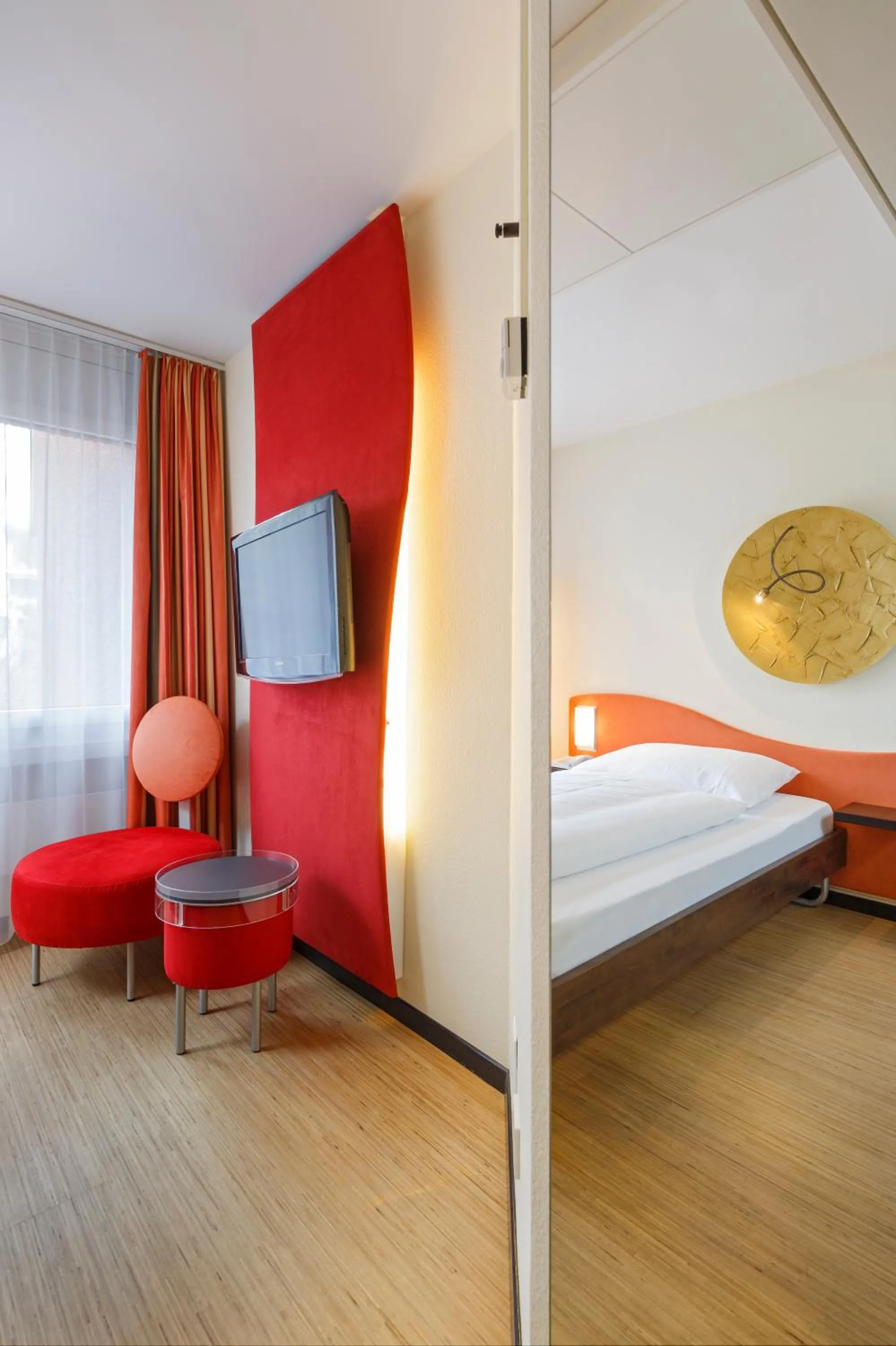 Photo of the whole room, Bed in Ramada by Wyndham Baden Hotel du Parc