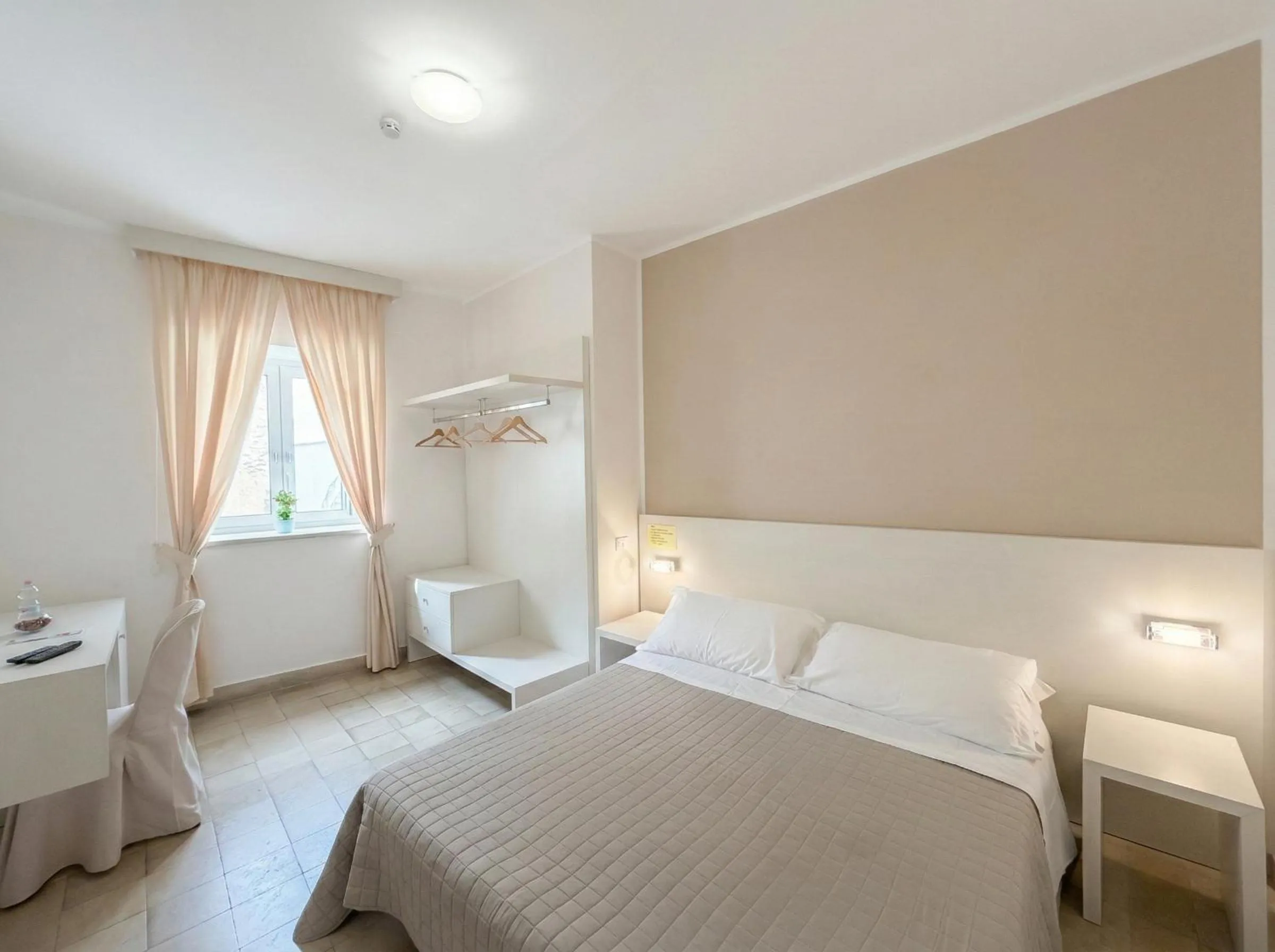 Bed in Ortigia Mastrarua rooms