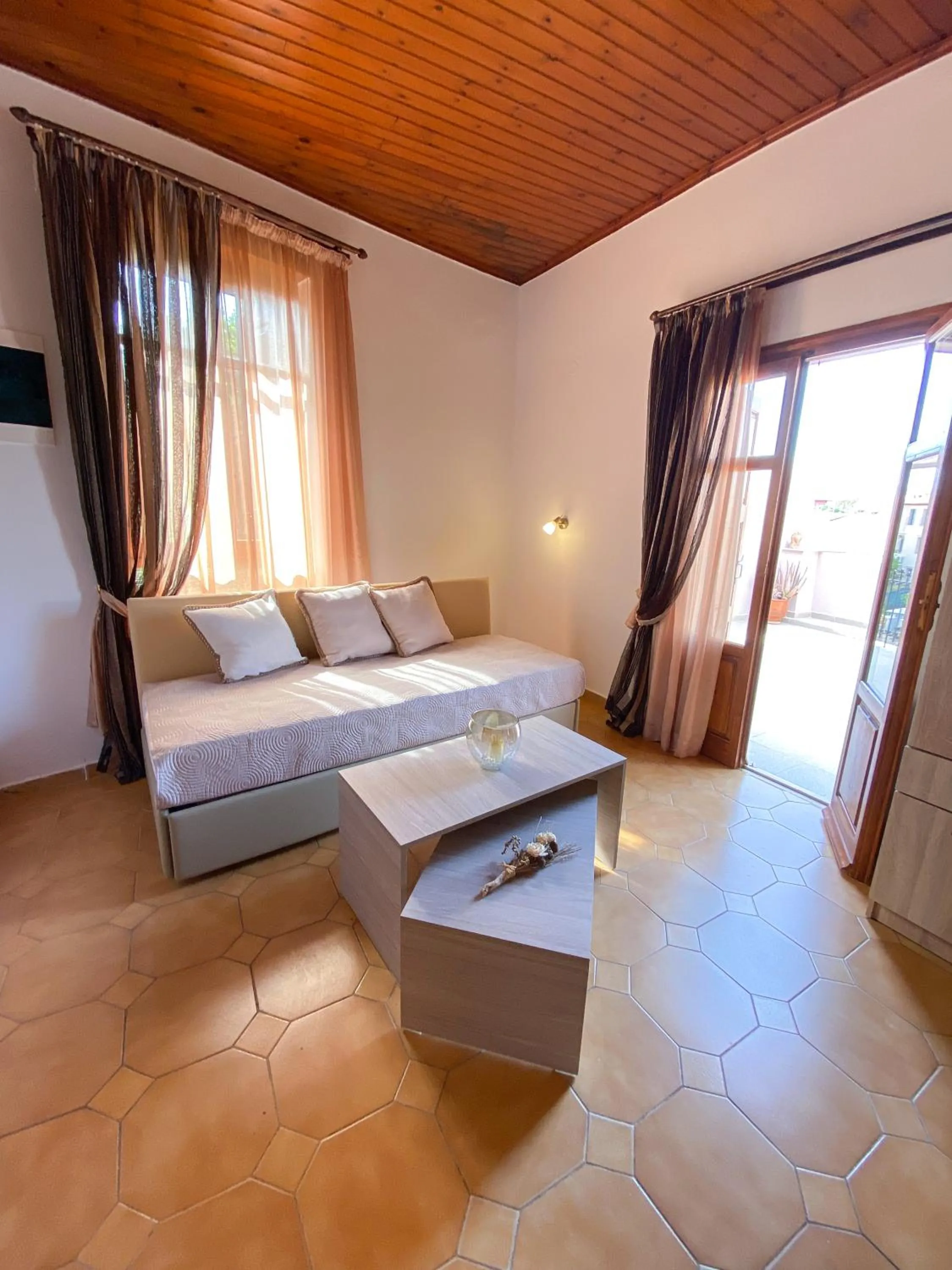 Living room, Bed in Casa Dasyra