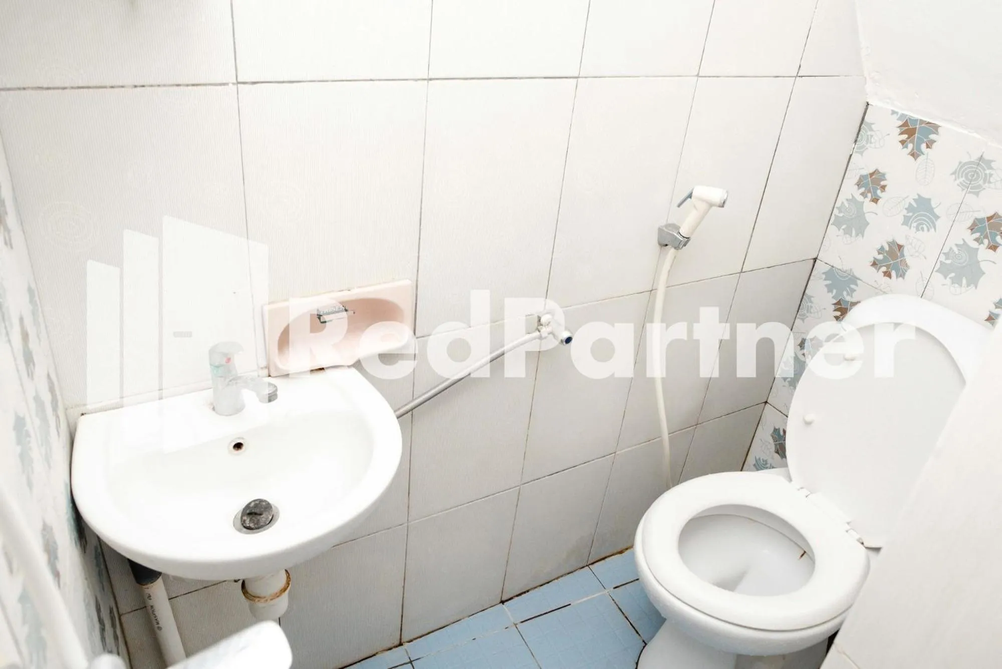 Toilet in Happy Inn Puspo Mitra RedDoorz