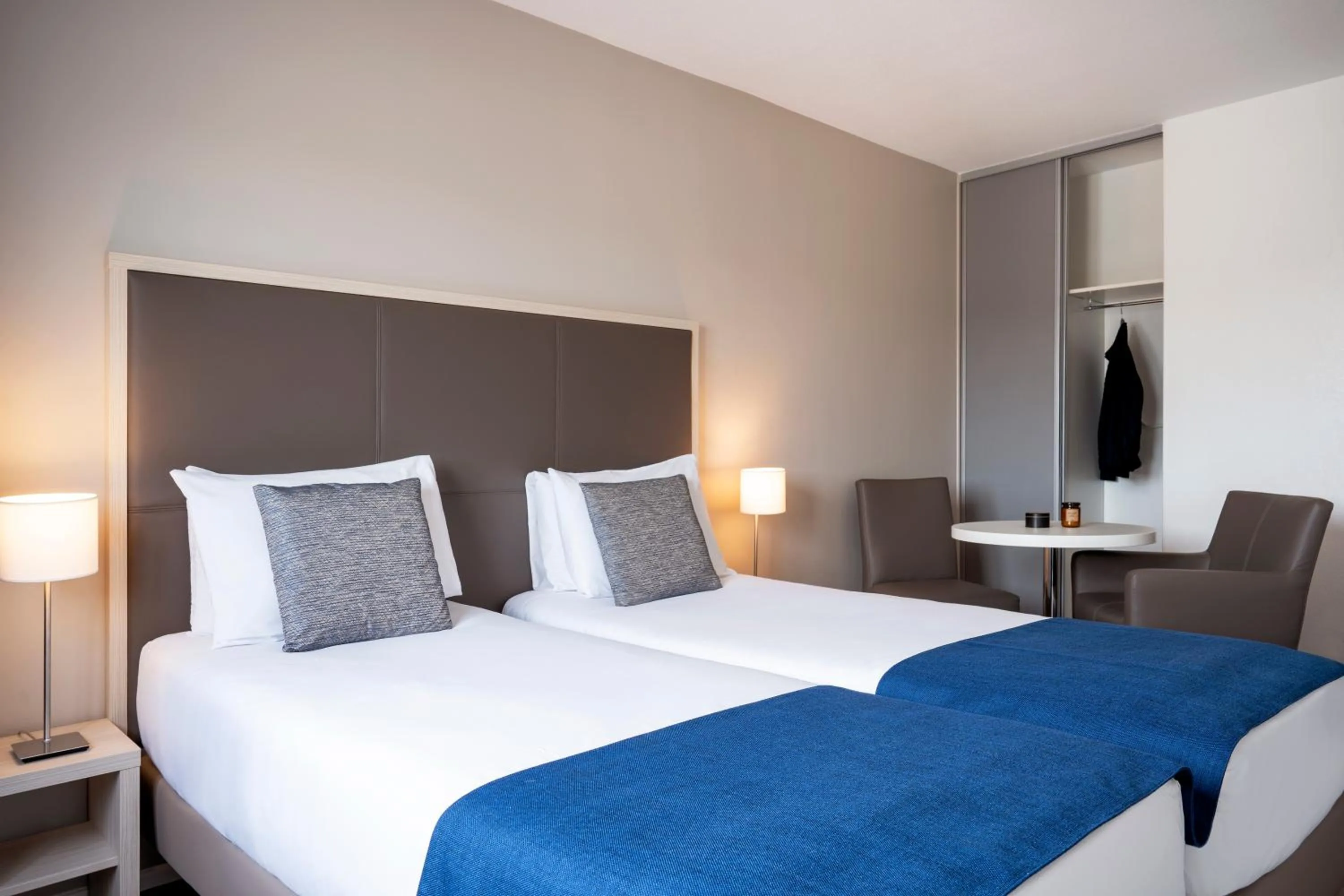 Bed in Séjours & Affaires Paris Vincennes