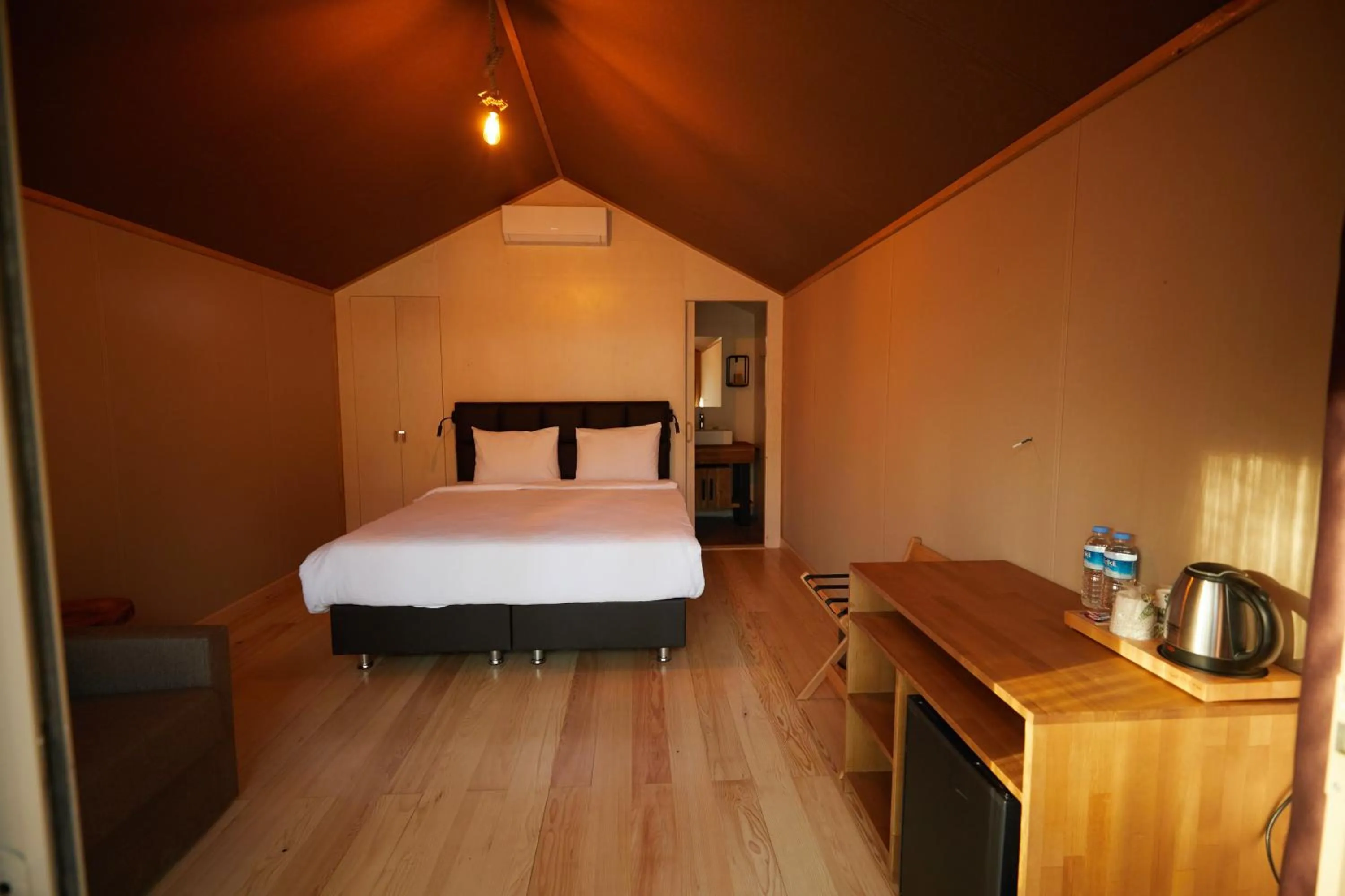 Bed in LONGOSPHERE GLAMPING