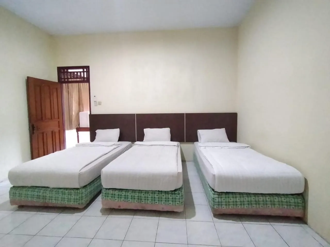 Bed in Grand Mutiara Hotel Puncak