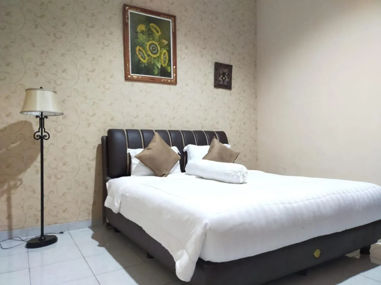 Bed in Grand Mutiara Hotel Puncak