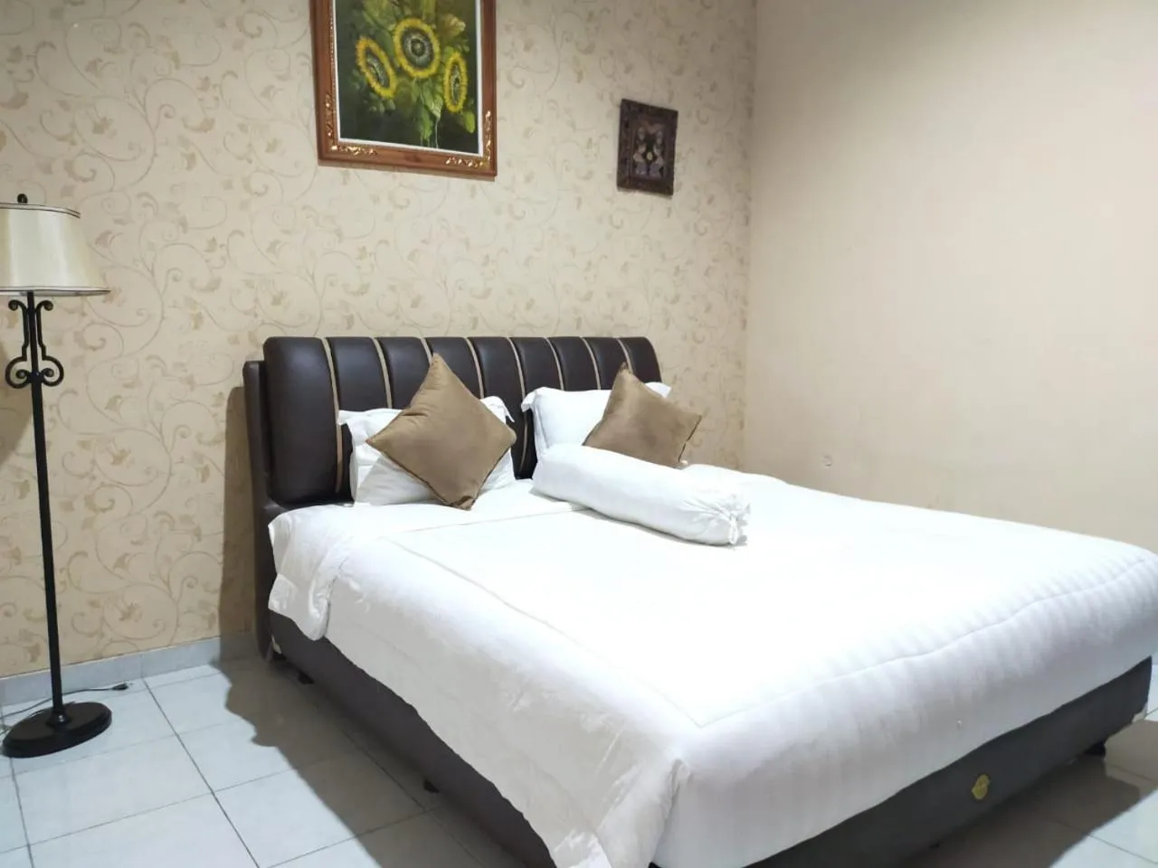 Bed in Grand Mutiara Hotel Puncak