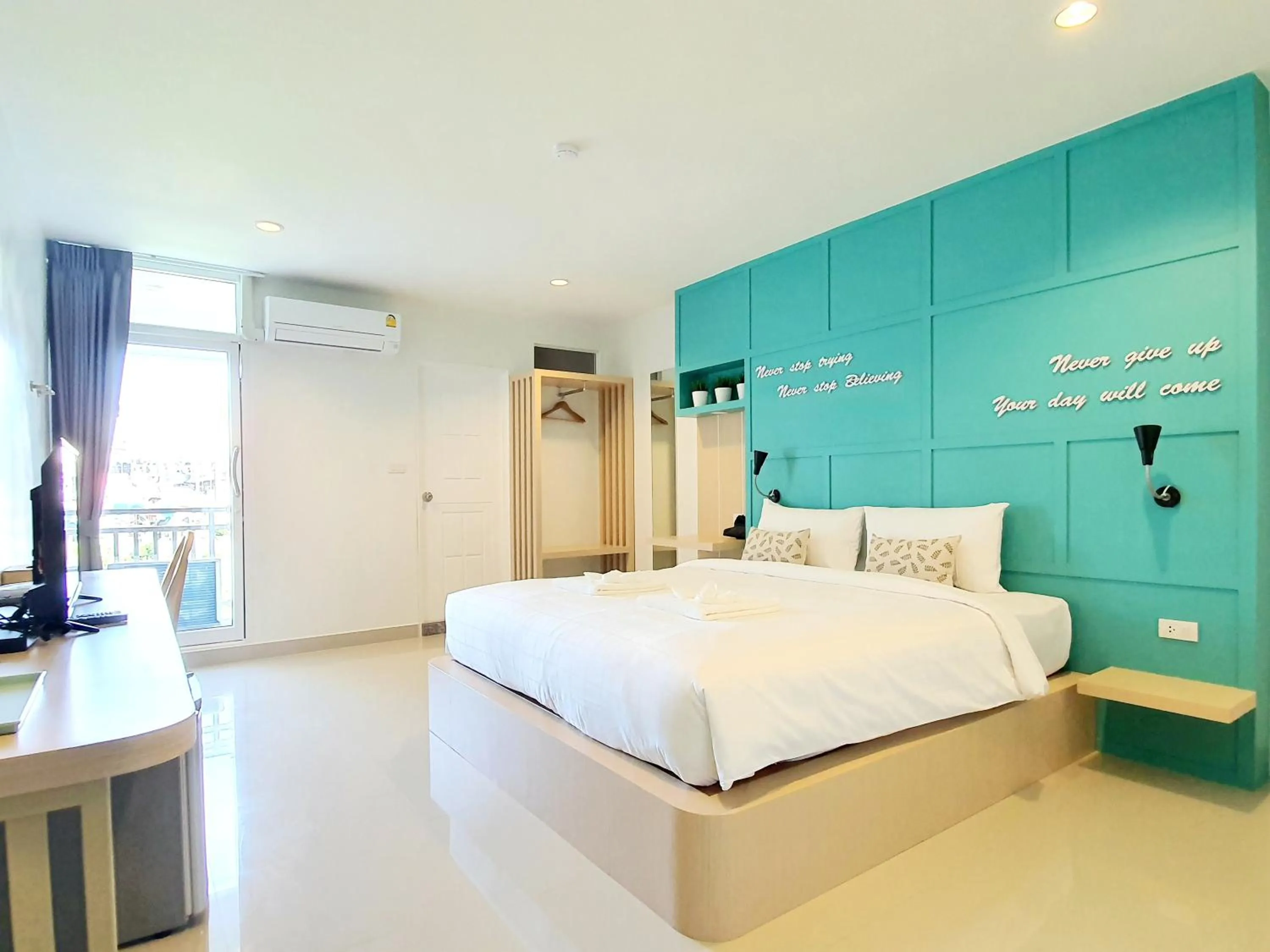 Photo of the whole room, Bed in Tiny Krabi Hotel