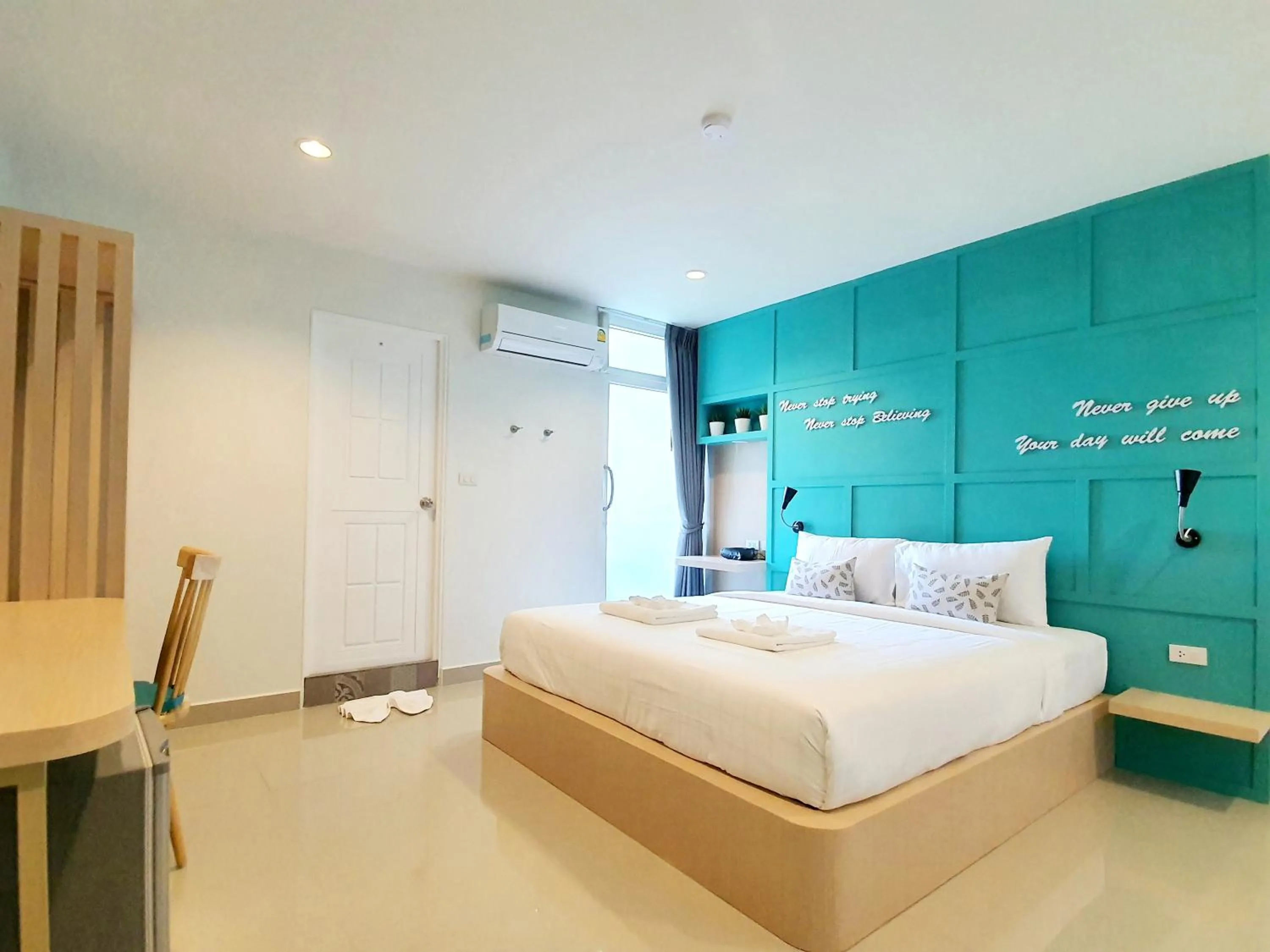 Photo of the whole room, Bed in Tiny Krabi Hotel