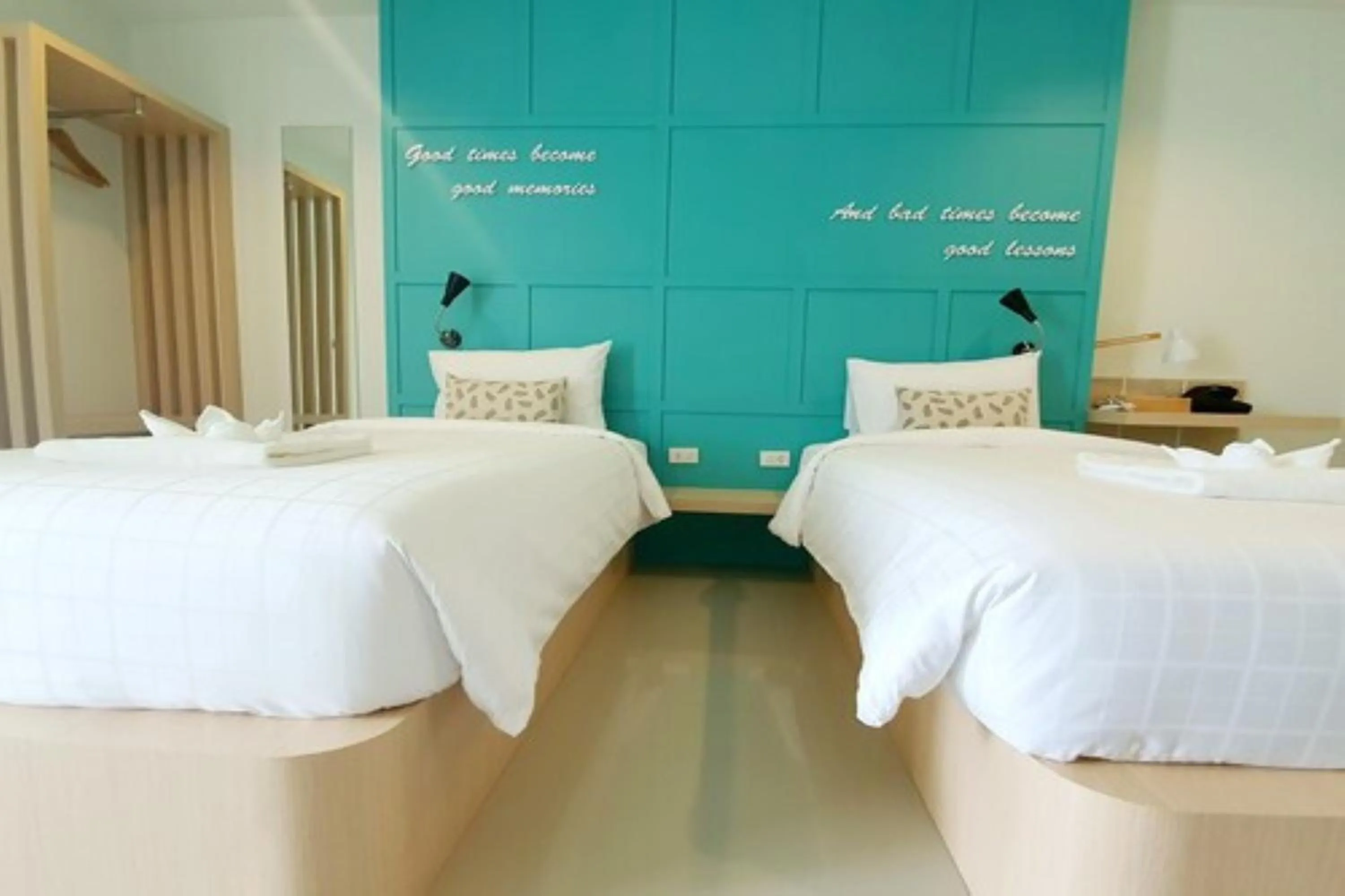 Bed in Tiny Krabi Hotel