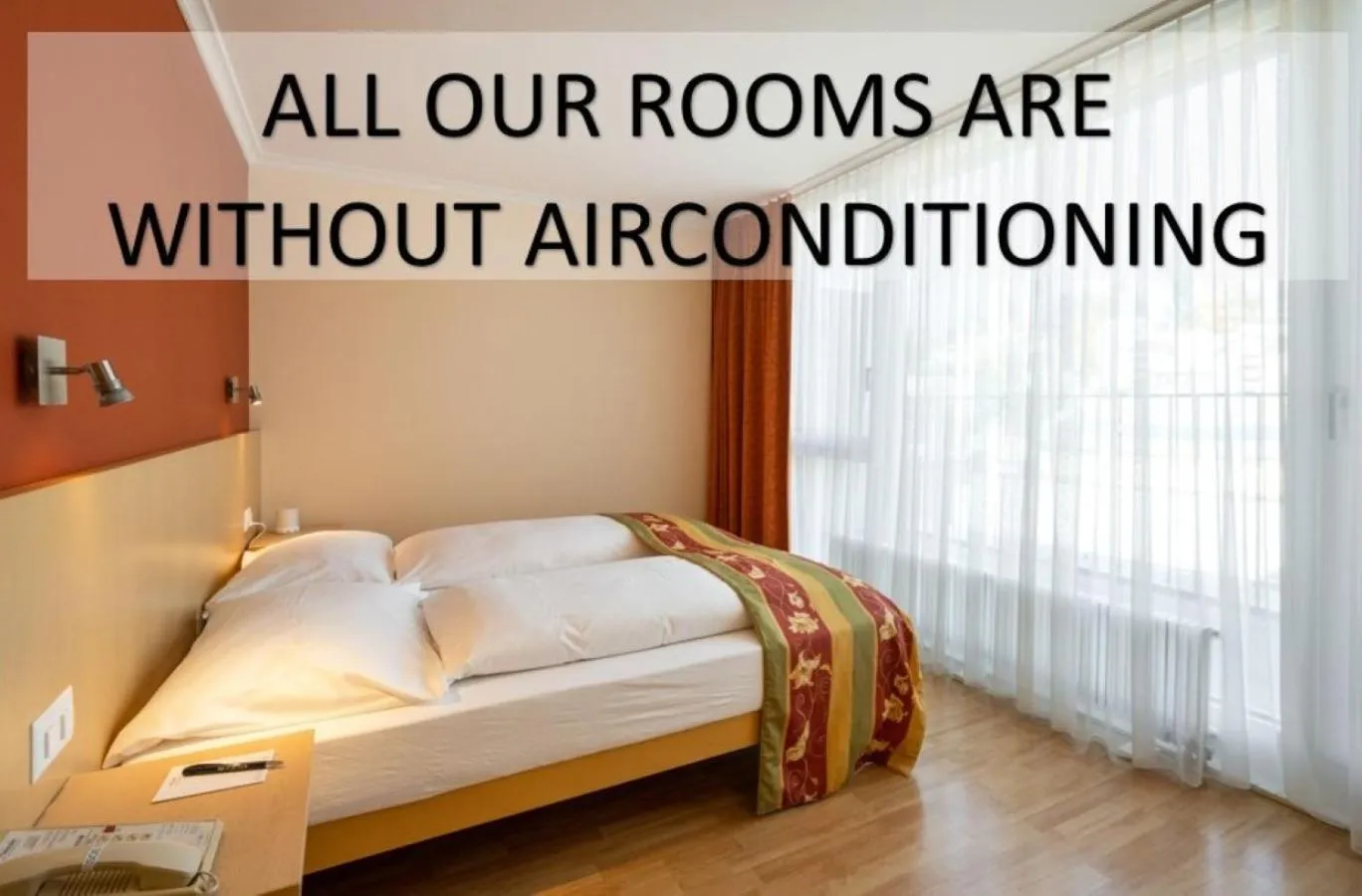 air conditioner, Bed in Ambassador Self Check-in Hotel