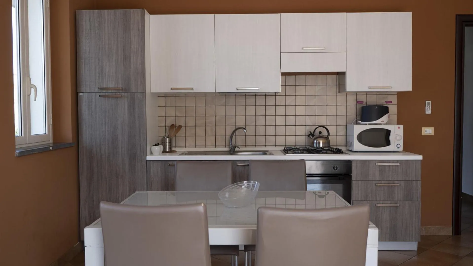Kitchen or kitchenette in Villa Galati Resort
