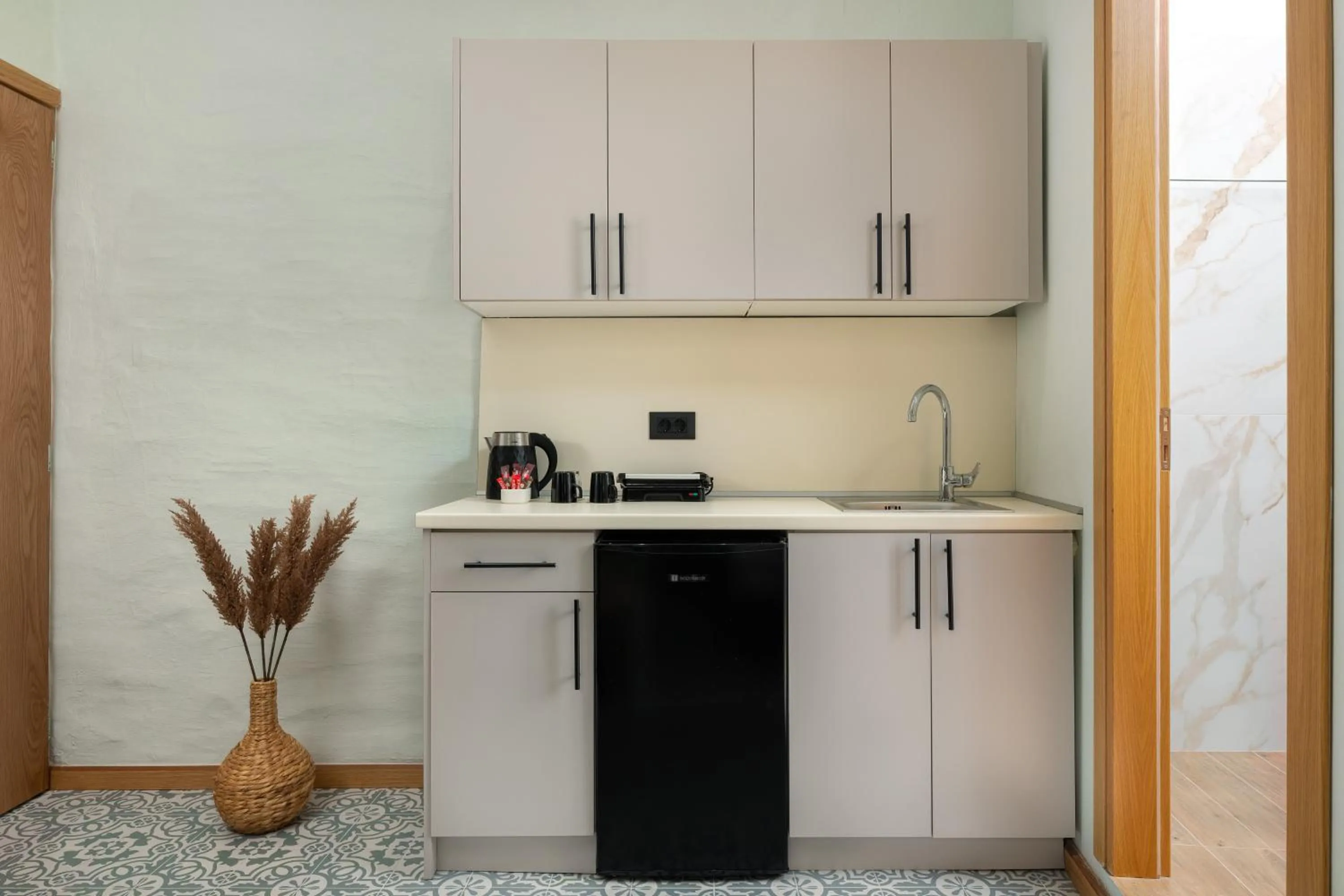 Kitchen or kitchenette in Acandia Hotel