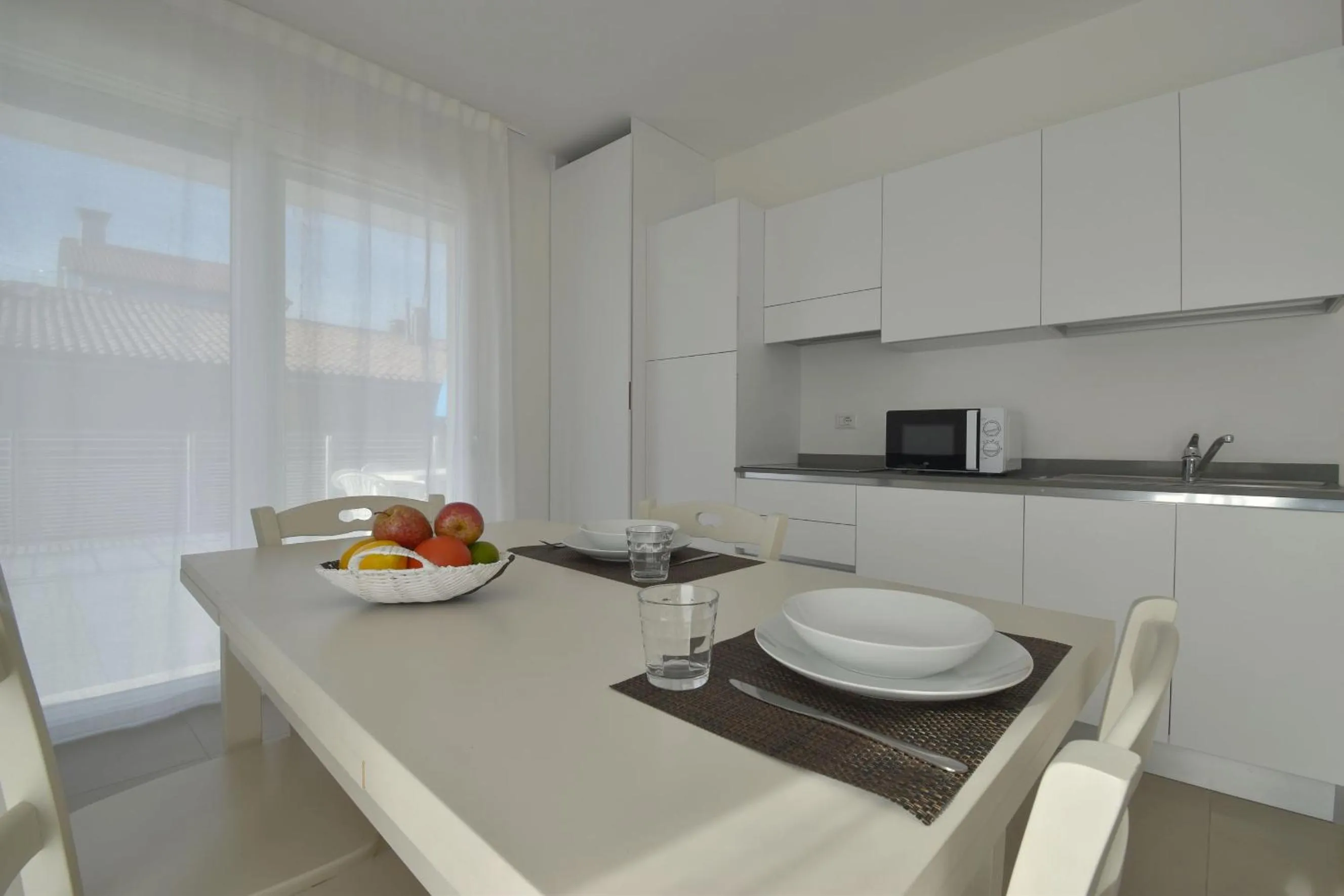 Kitchen or kitchenette in Residence Al Molo - Agenzia Cocal