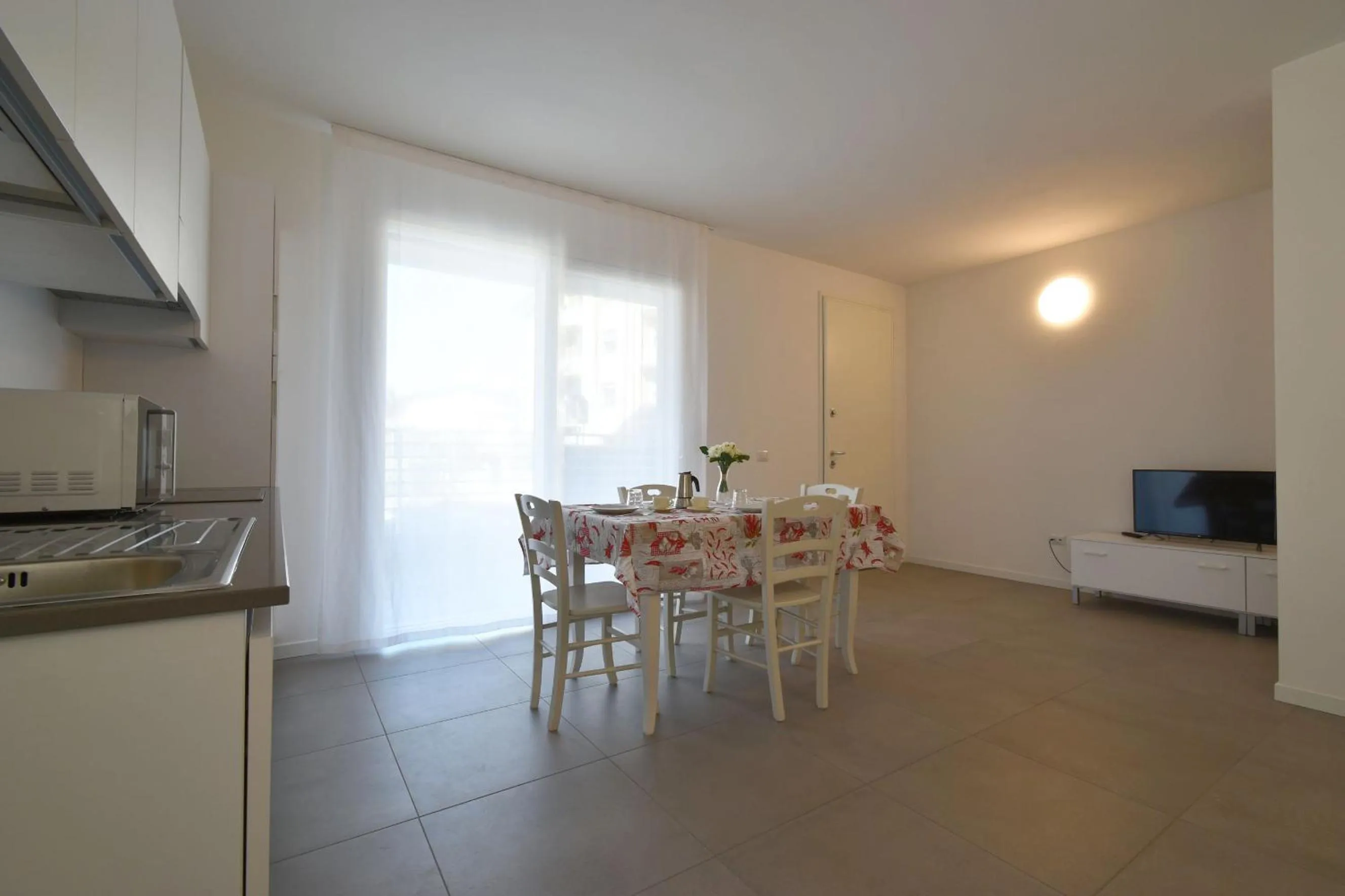 Kitchen or kitchenette in Residence Al Molo - Agenzia Cocal