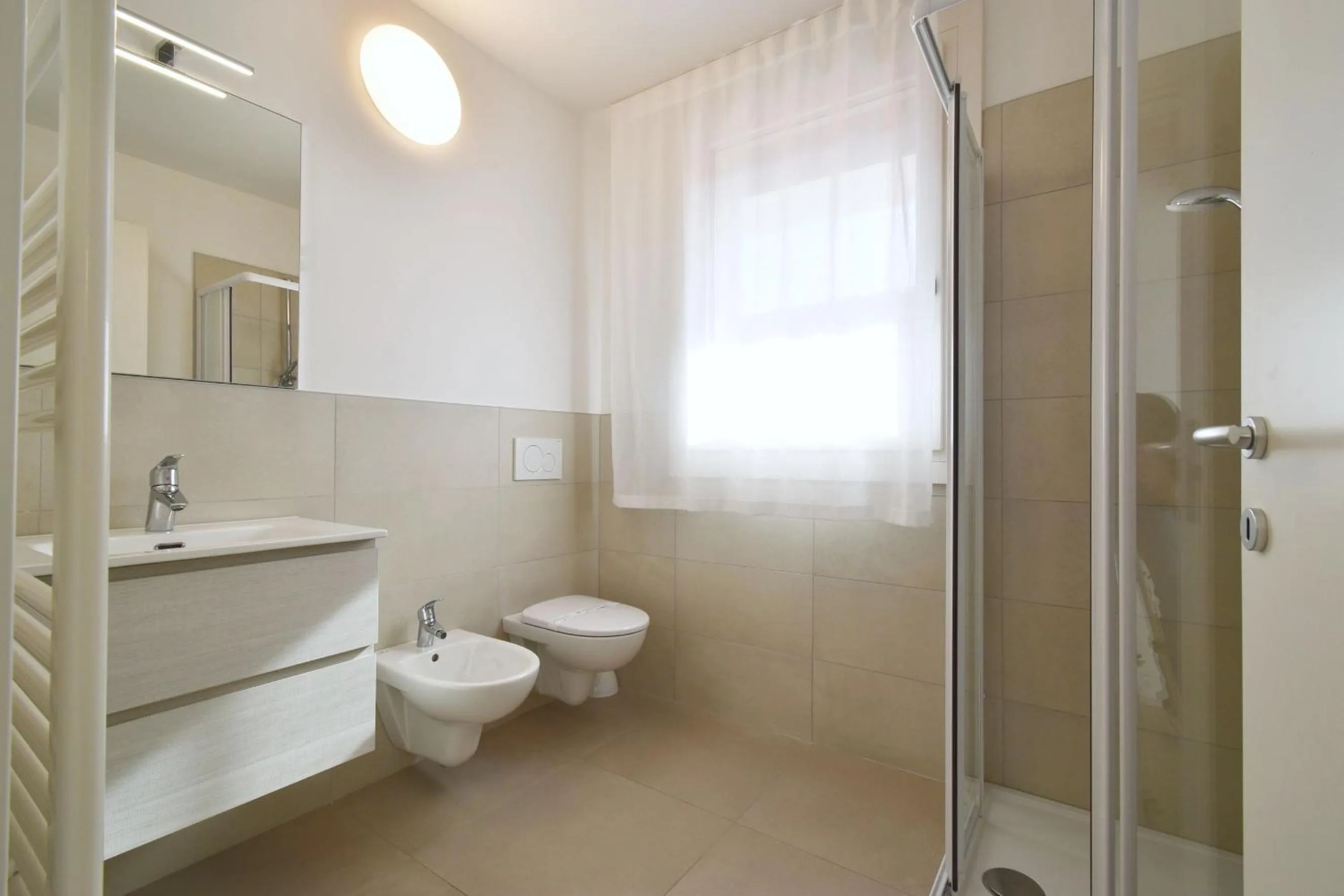 Bathroom in Residence Al Molo - Agenzia Cocal