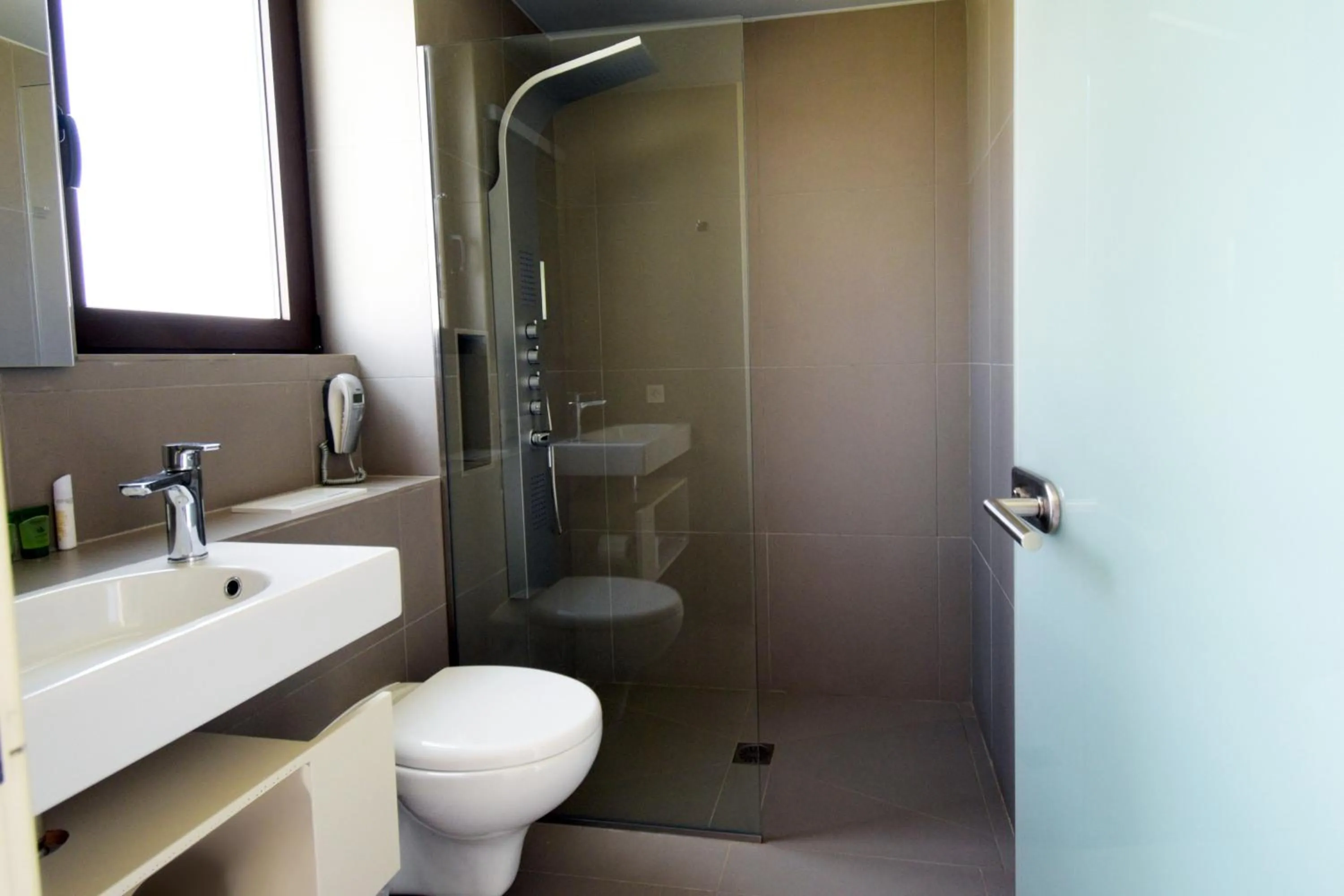 Bathroom in Geraniotis Hotel and Resort