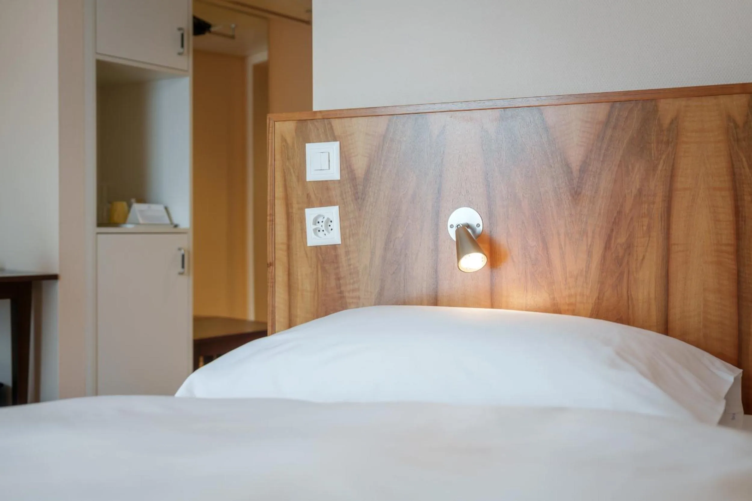 Bed in Hotel Schweizerhof Basel