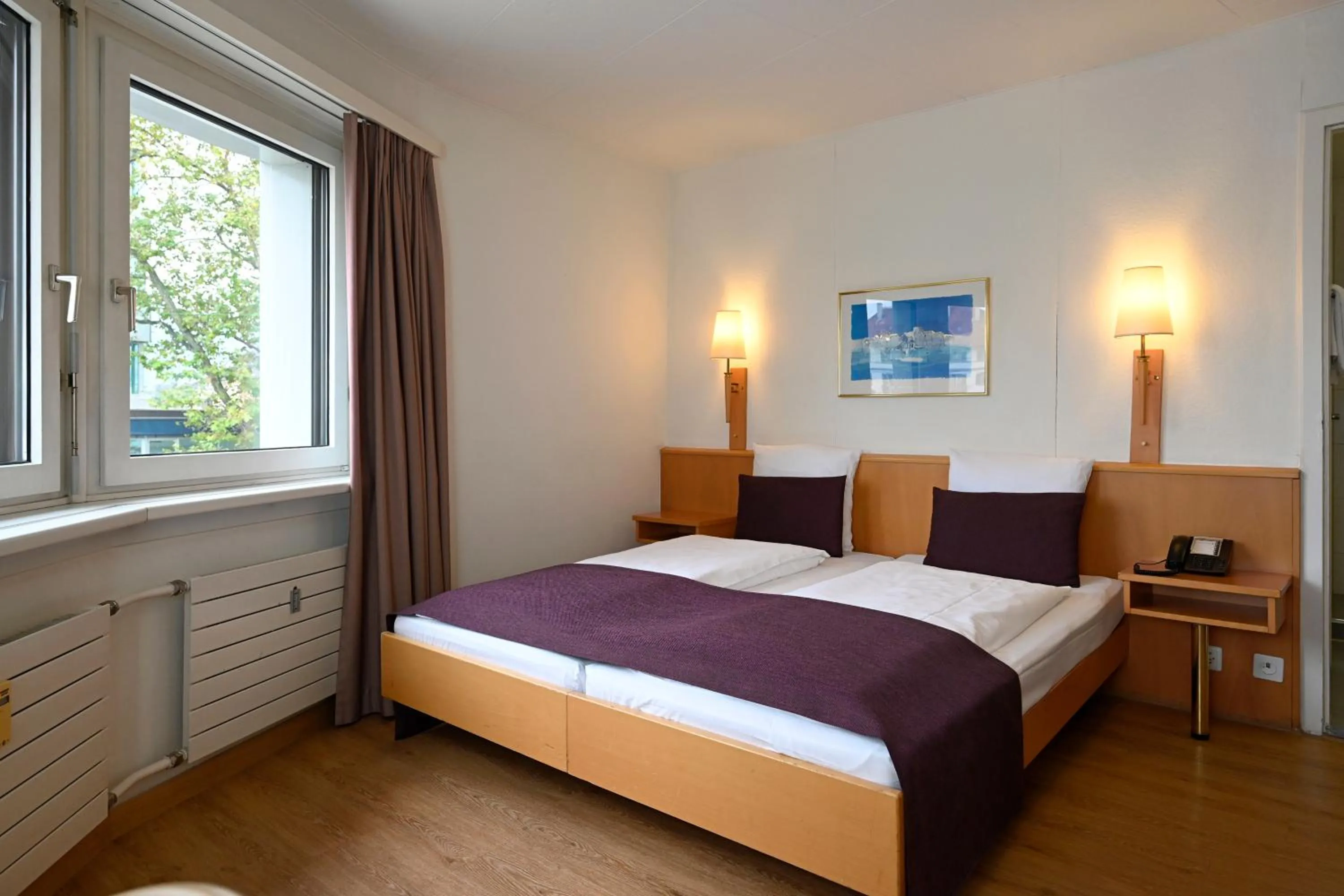 Photo of the whole room, Bed in Olympia Hotel Zurich