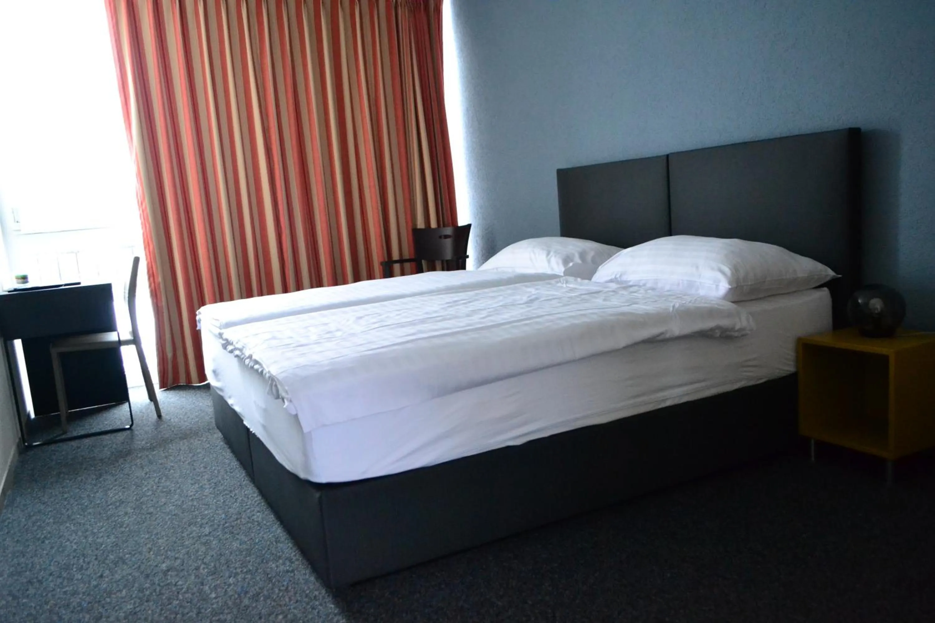 Bed in Hotel Les Rives Du Doubs