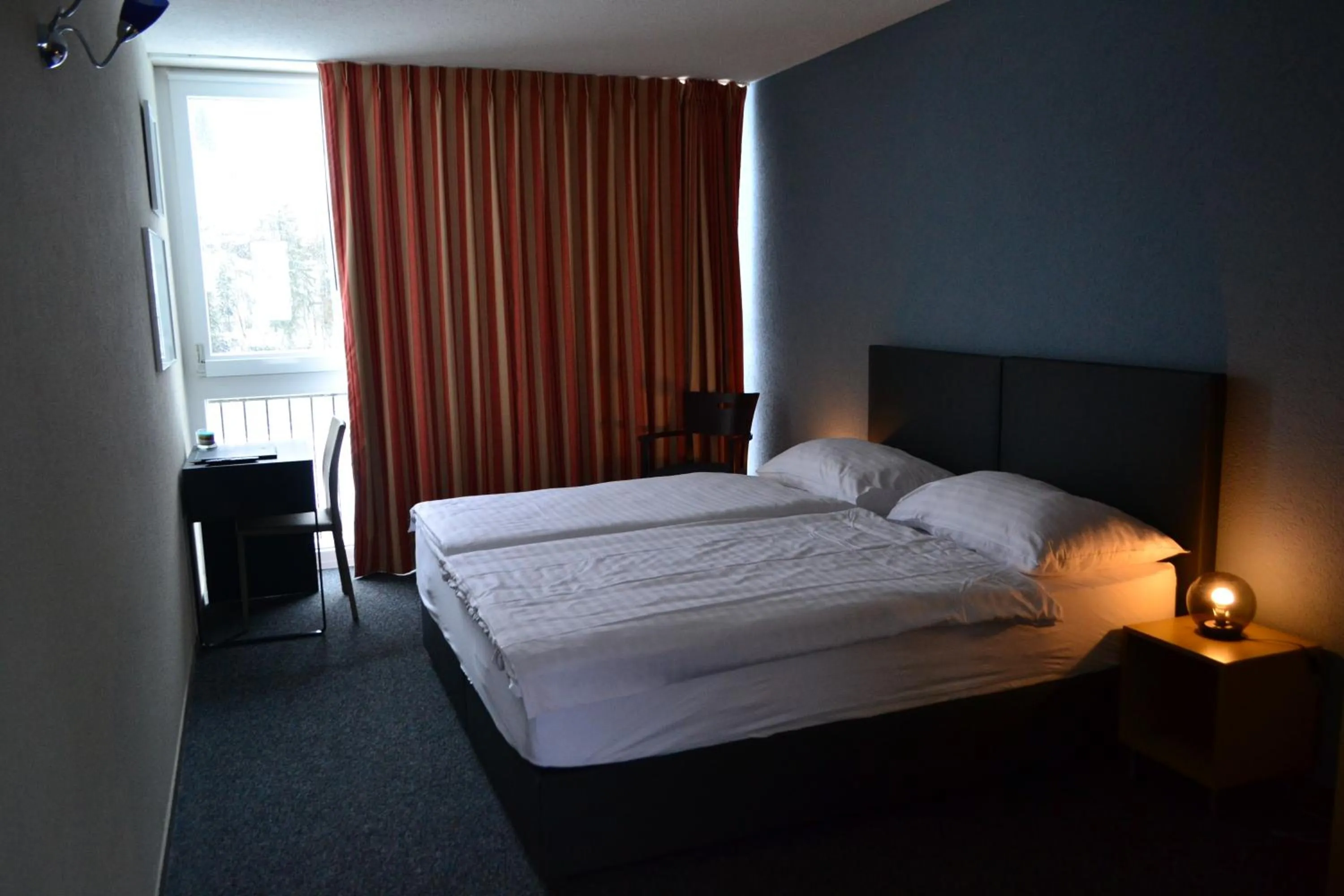 Bed in Hotel Les Rives Du Doubs