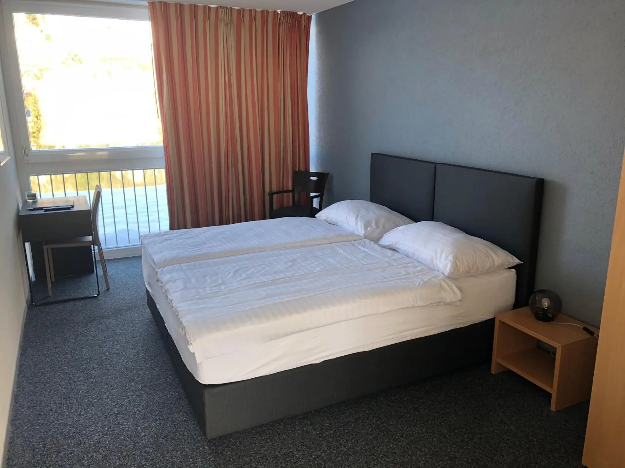 Bed in Hotel Les Rives Du Doubs