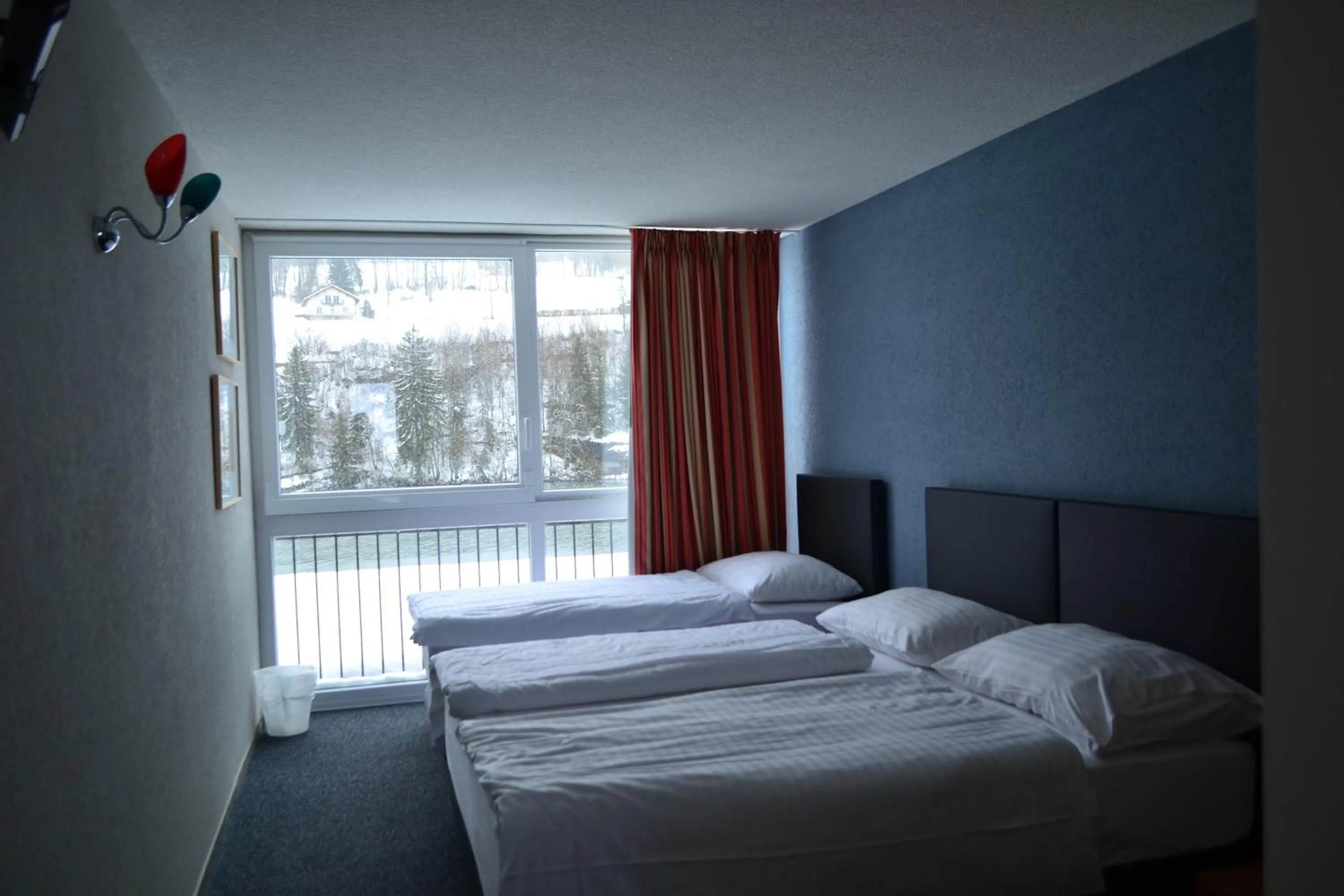 Bed in Hotel Les Rives Du Doubs