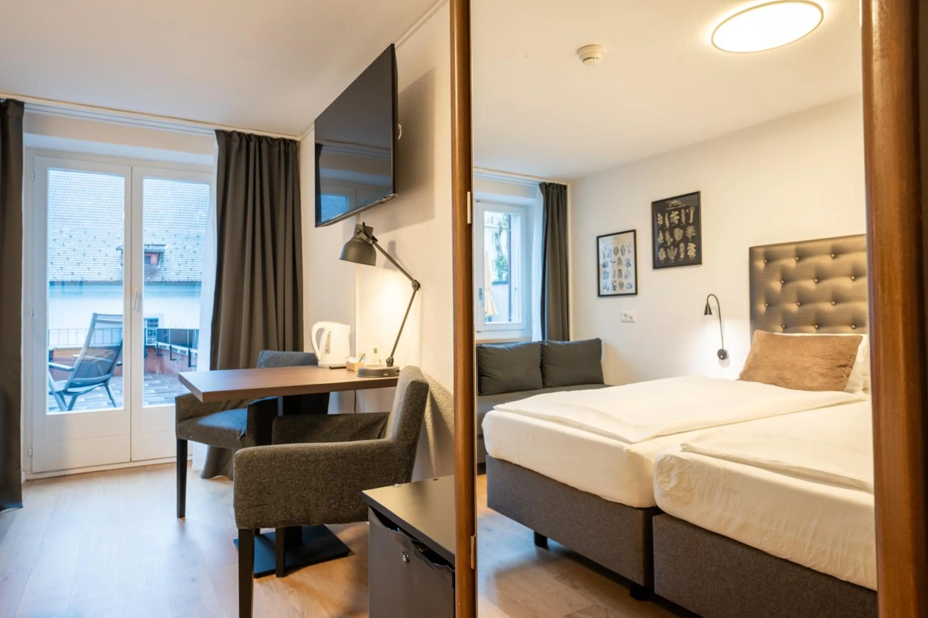 Photo of the whole room, Bed in Hotel Baslertor