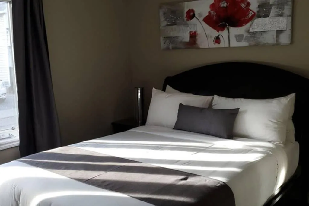 Bed in 2-Bedroom Apartment Sweet #2 by Amazing Property Rentals