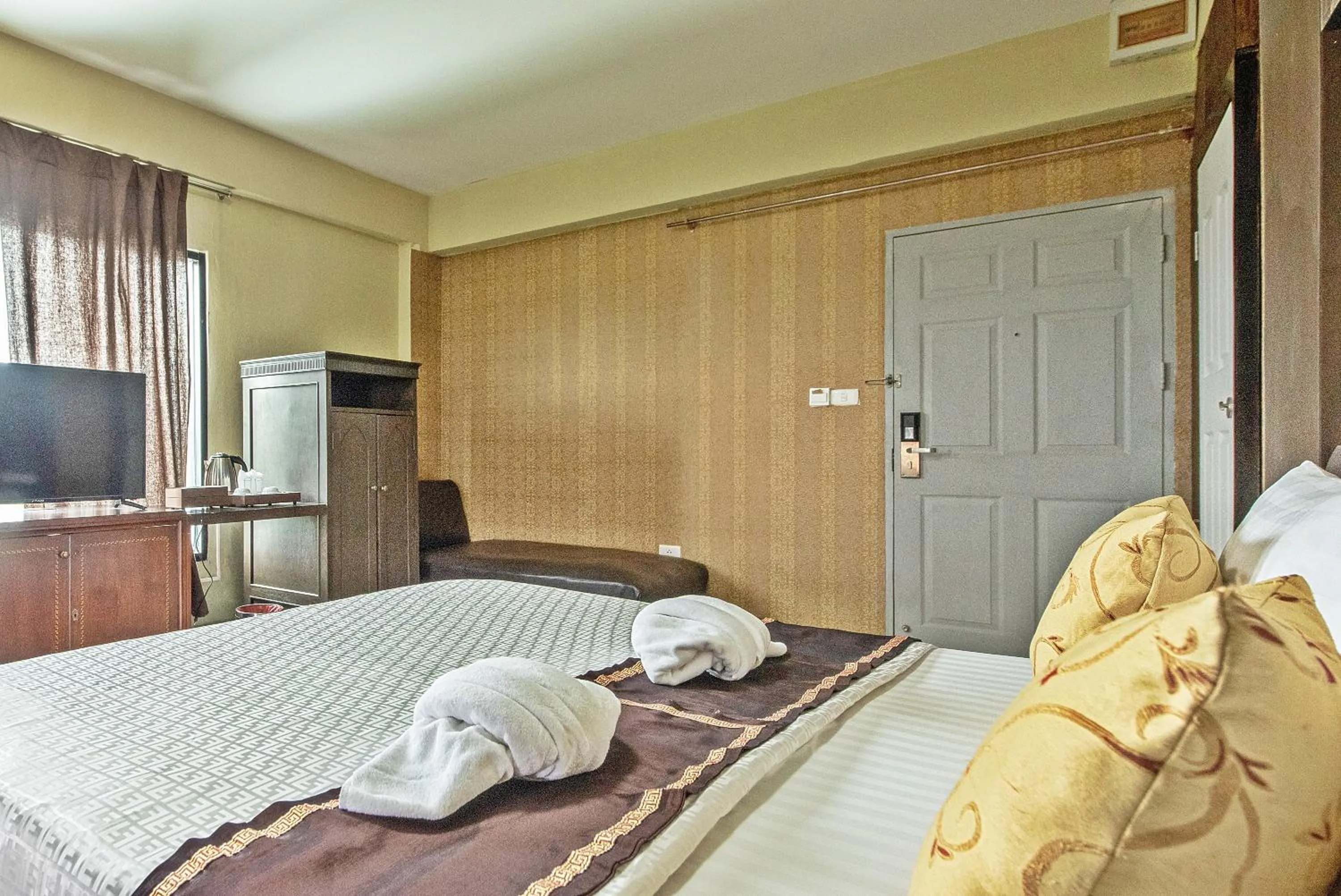 Bed in The Wing Design Hotel