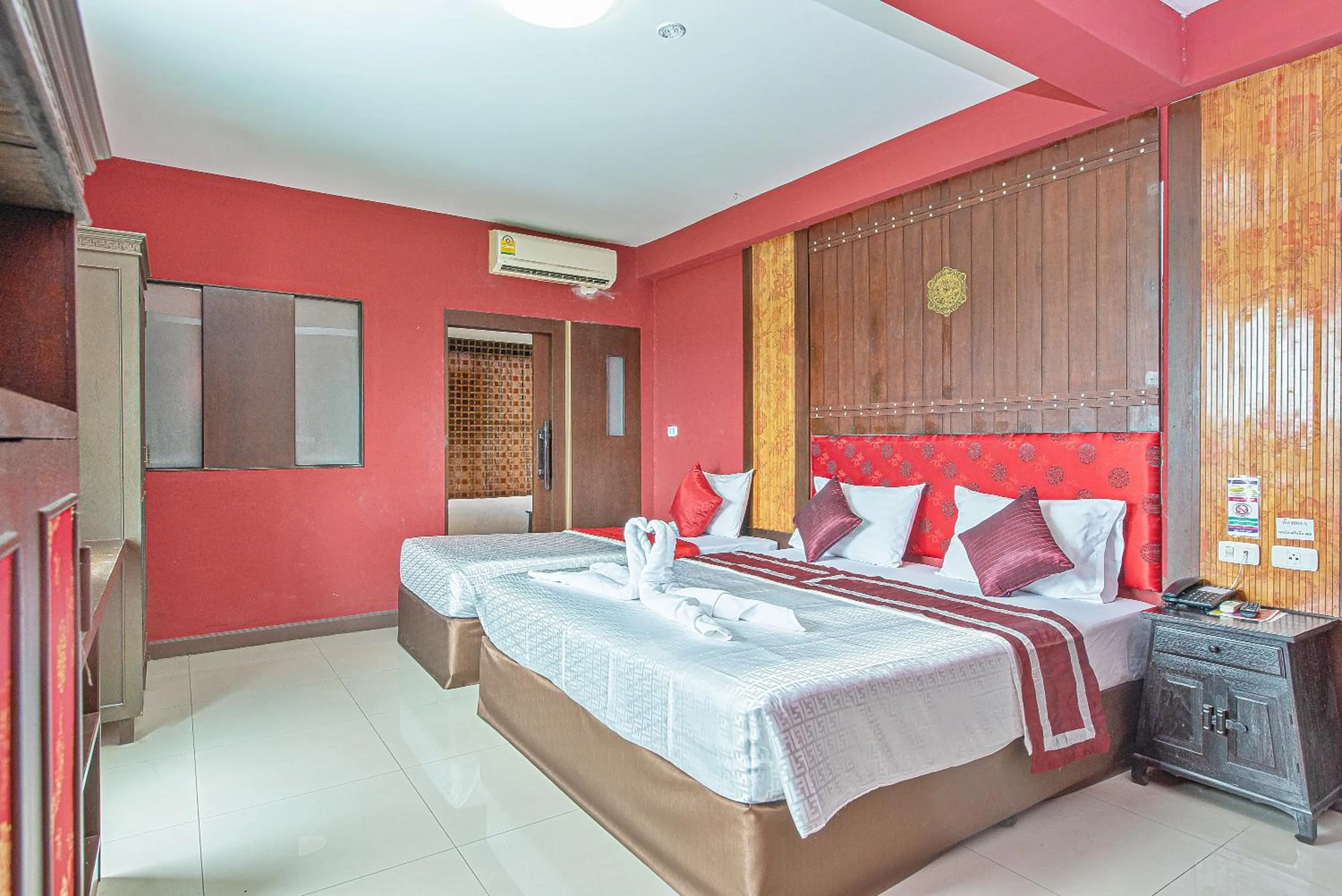 Bed in The Wing Design Hotel