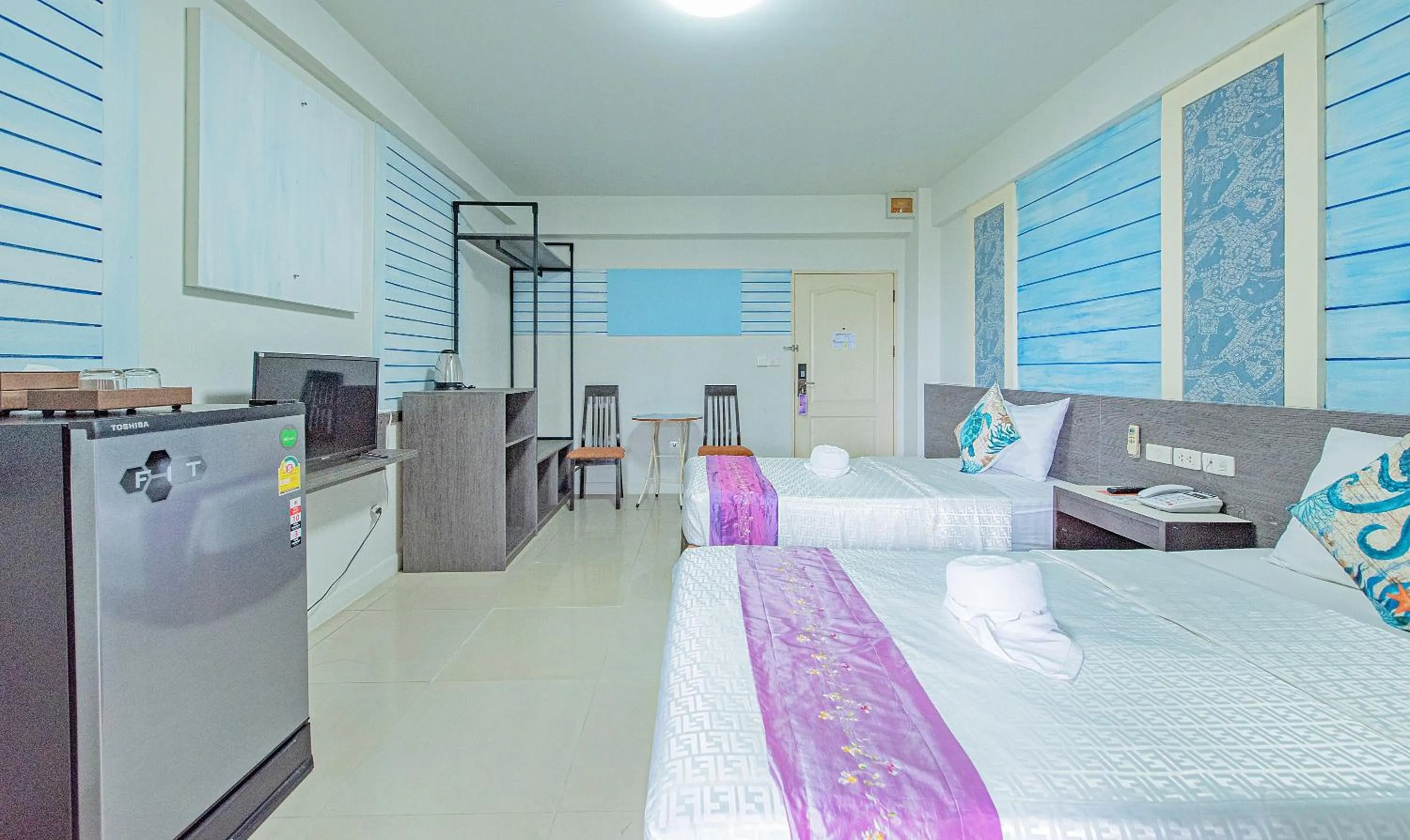 Bed in The Wing Design Hotel