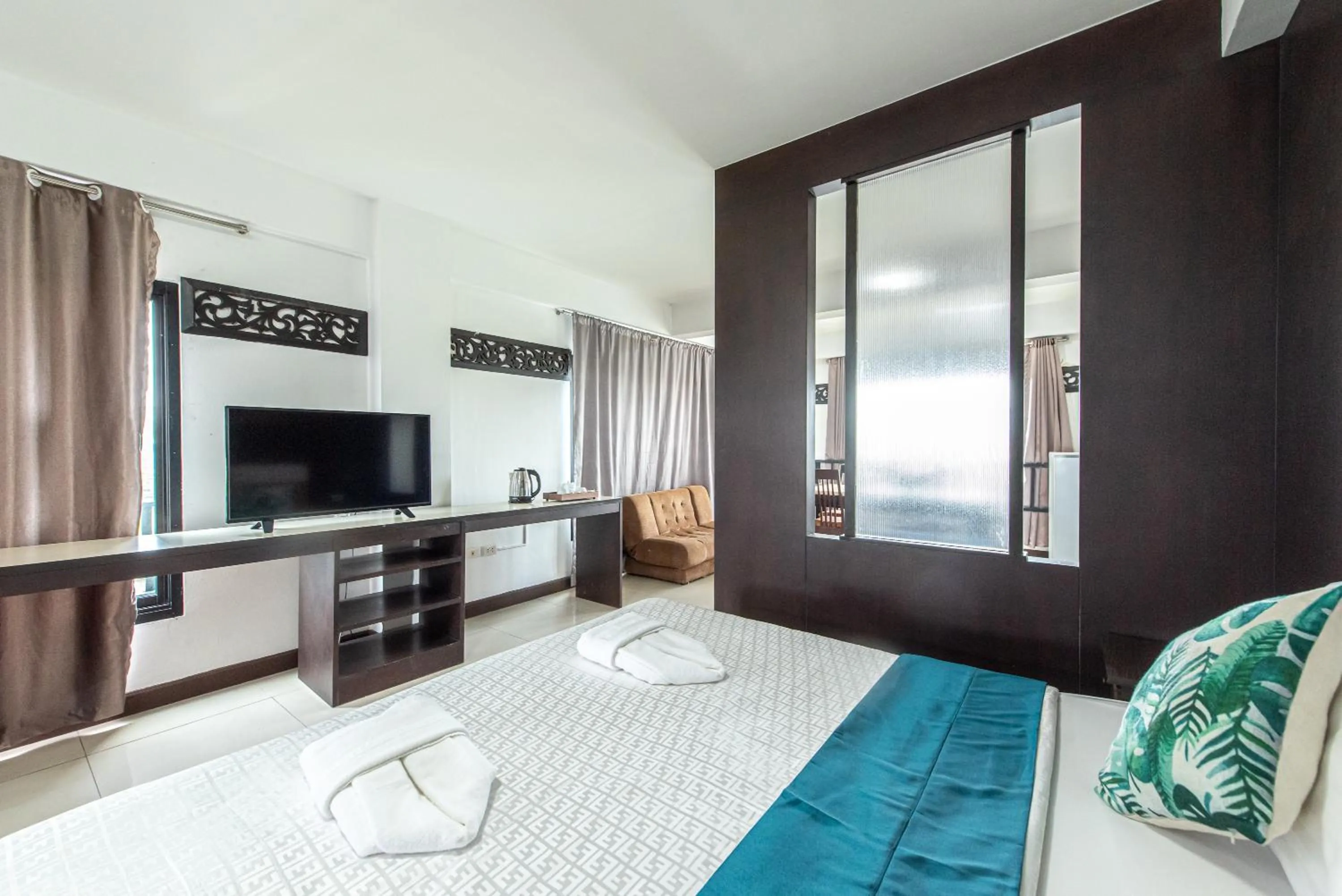 Bed in The Wing Design Hotel