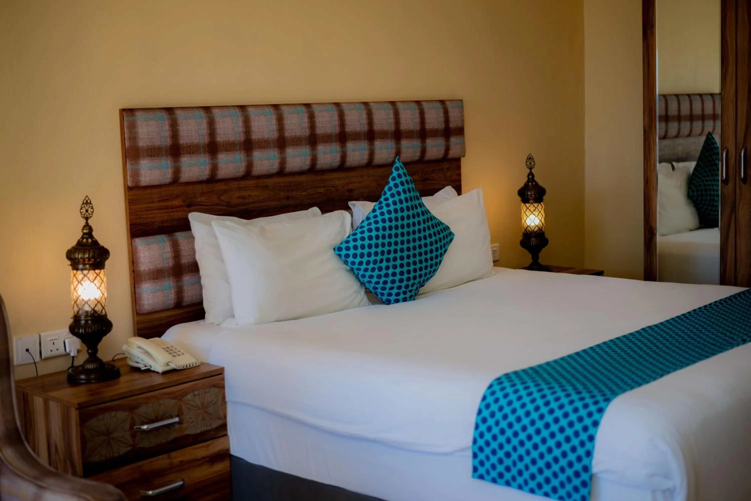 Bed in Golden Palm Boutique Zanzibar