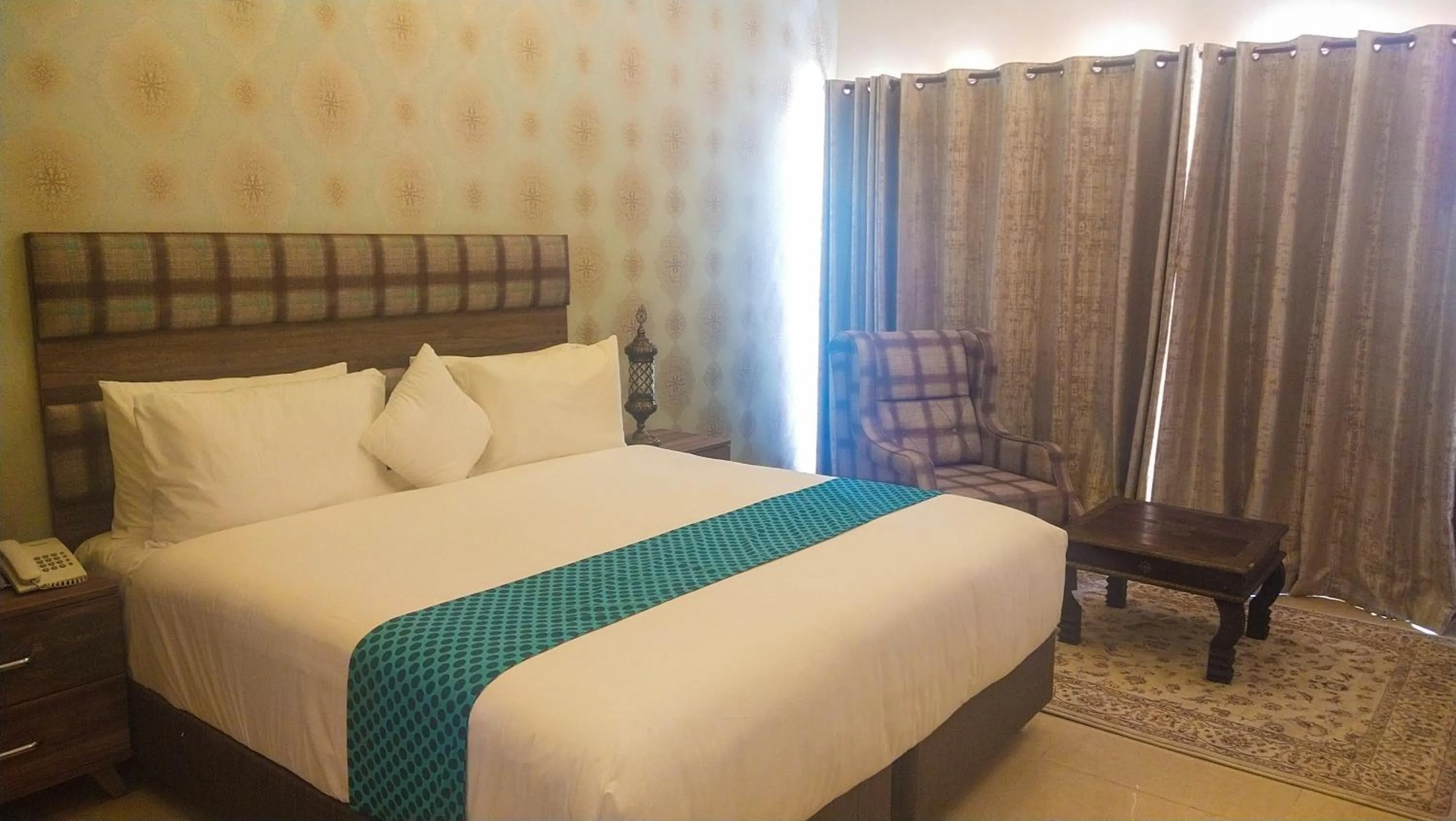 Bed in Golden Palm Boutique Zanzibar