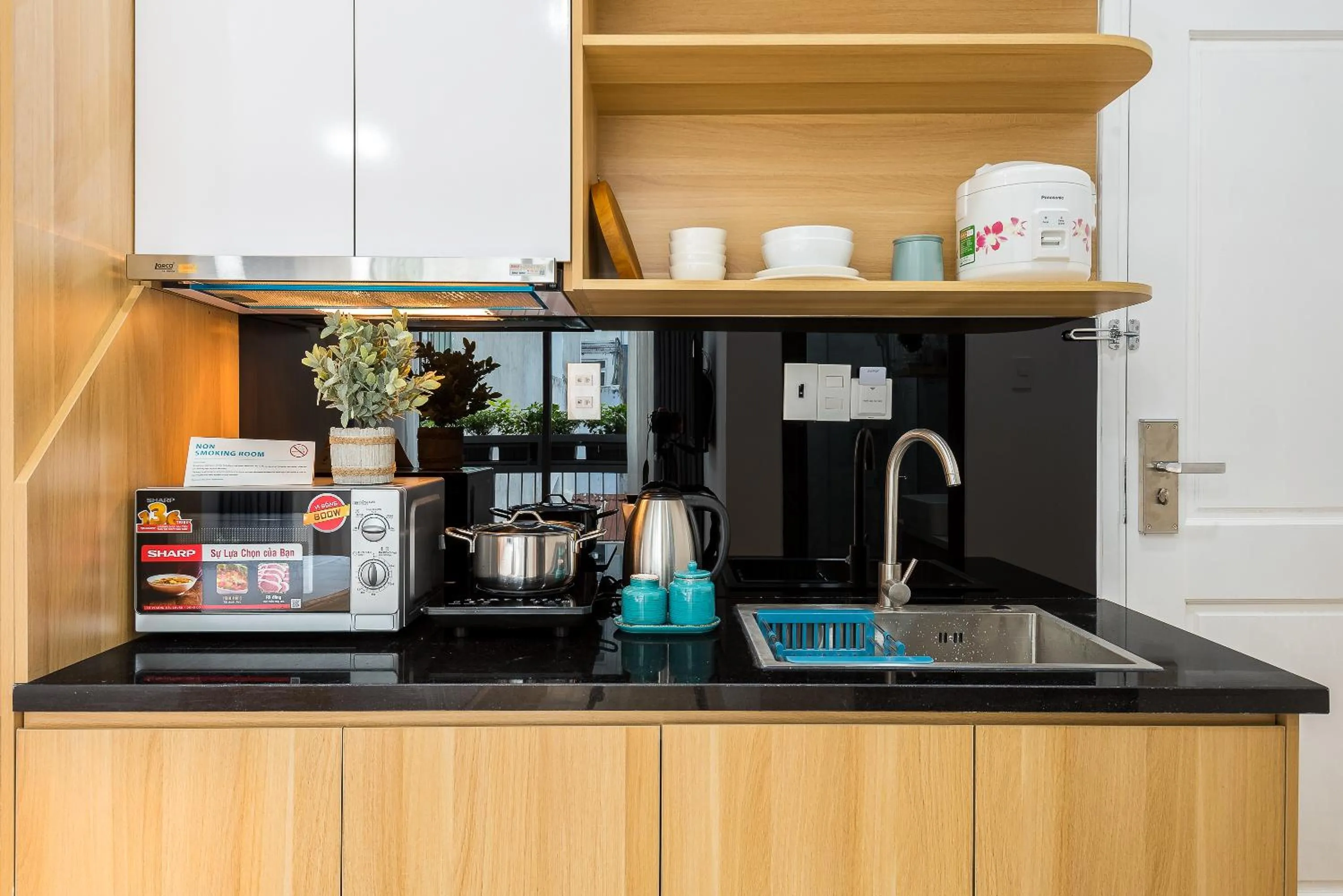 Kitchen or kitchenette in Cozrum Homes Ambera House