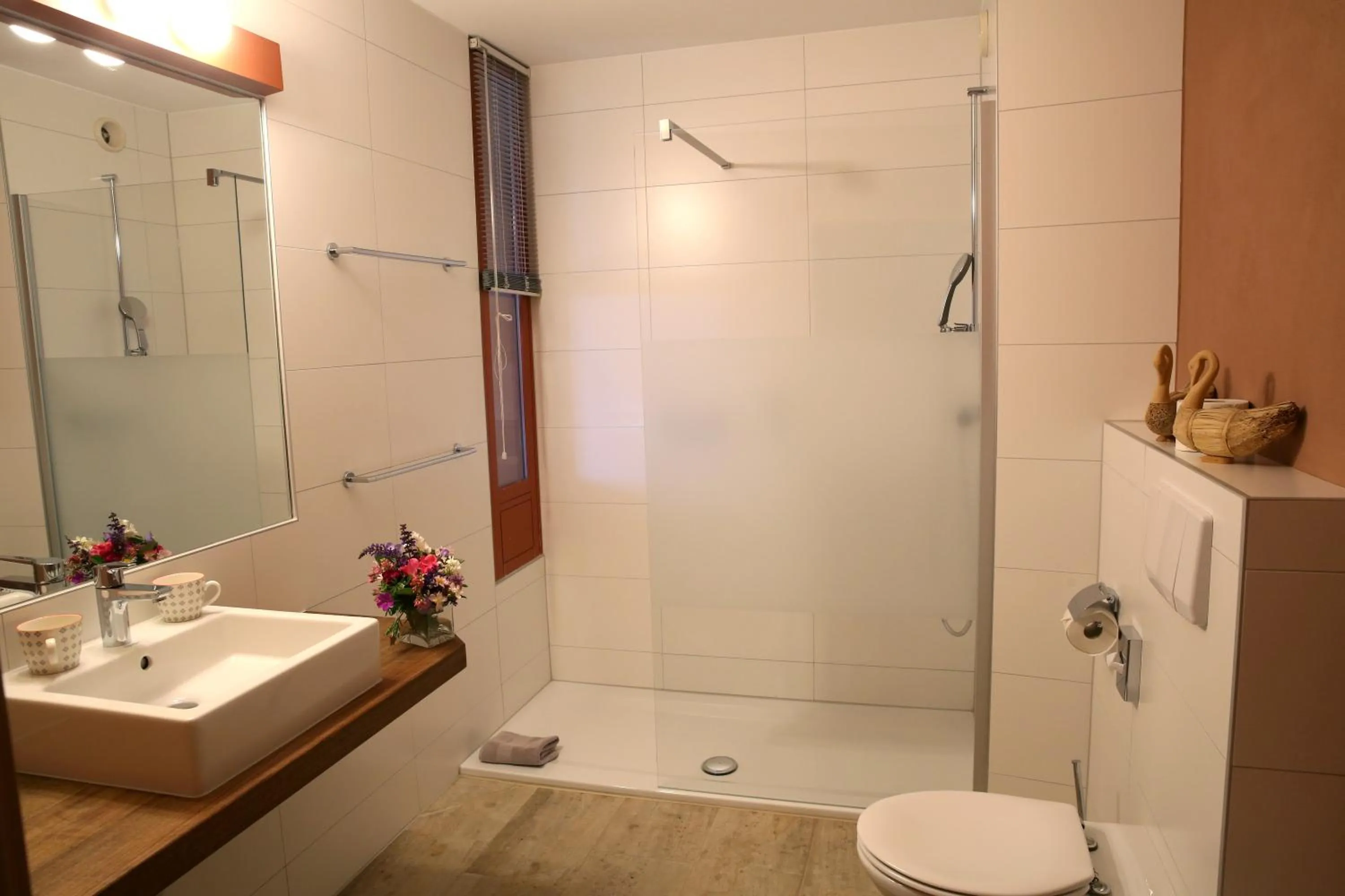 Bathroom in EcoHotel L’Aubier