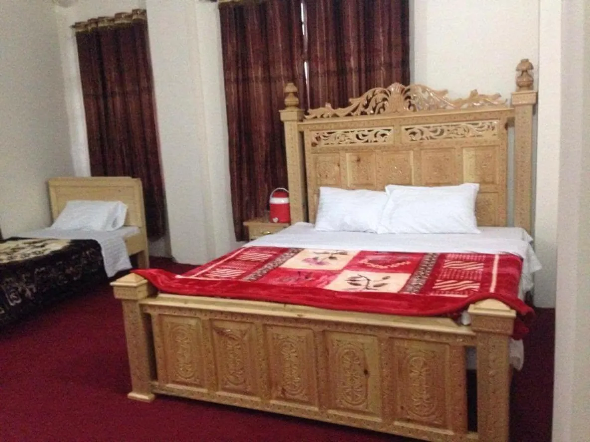 Bed in FR Darya E Swat Hotel