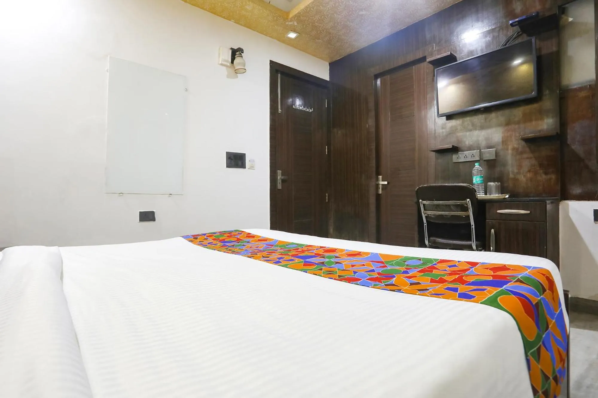 Bed in FabHotel NK Residency