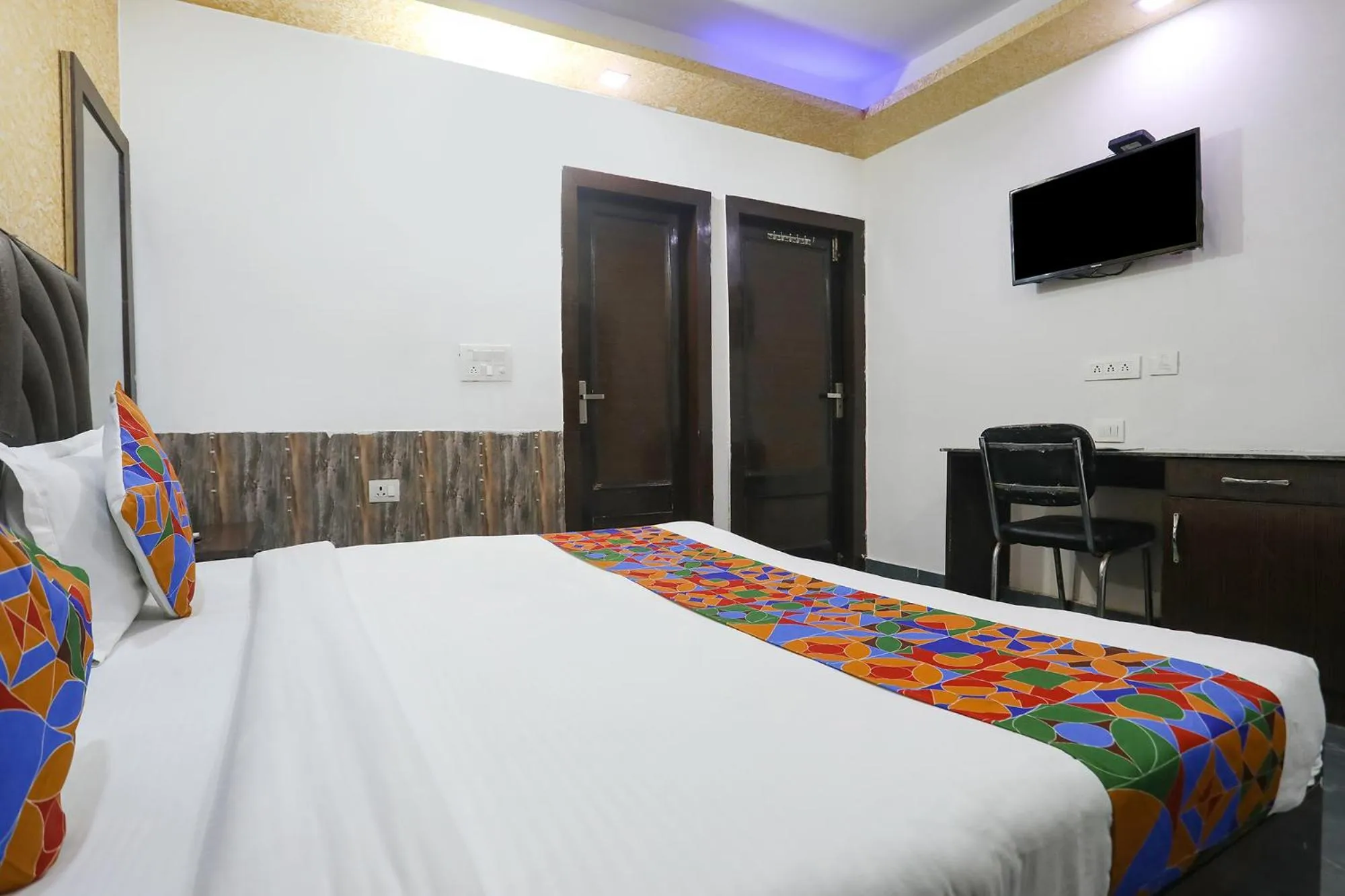 Bed in FabHotel NK Residency