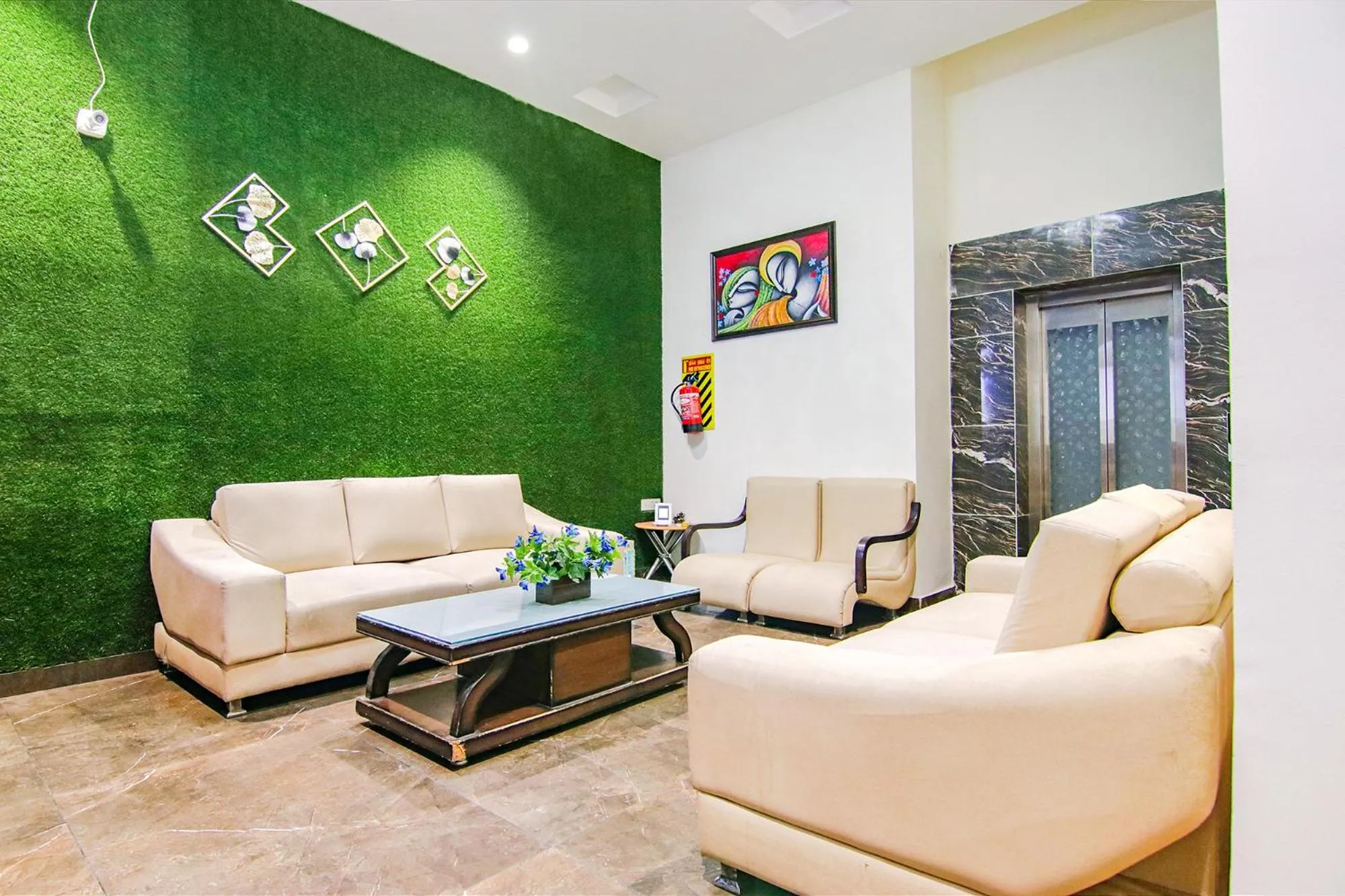 Seating area in FabHotel Royal Mapple