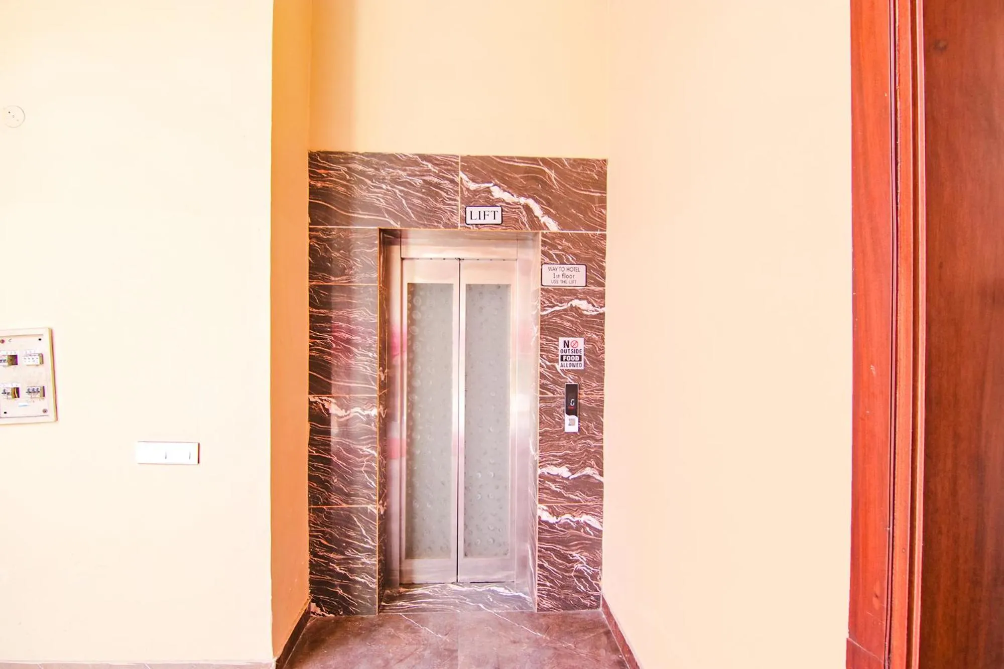 elevator in FabHotel Royal Mapple