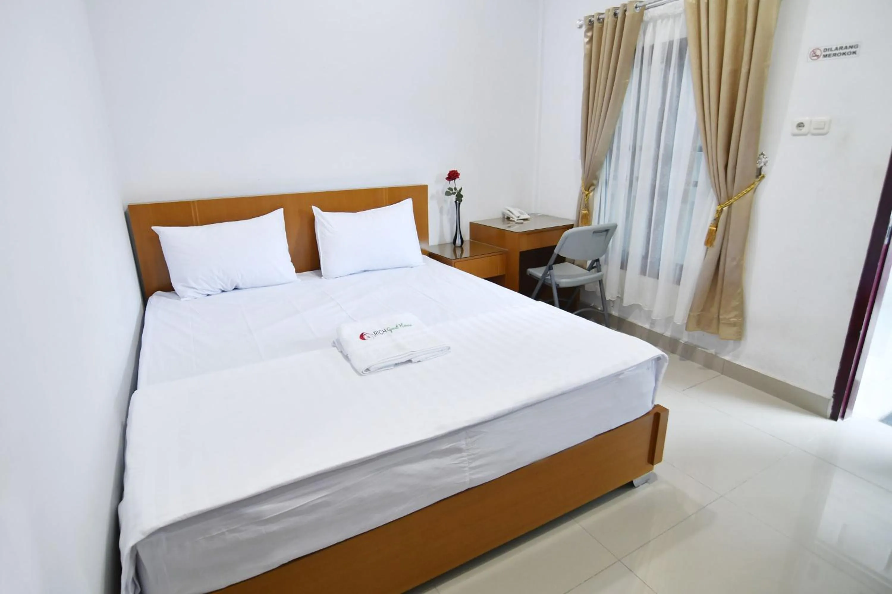 Bed in Rich Guesthouse