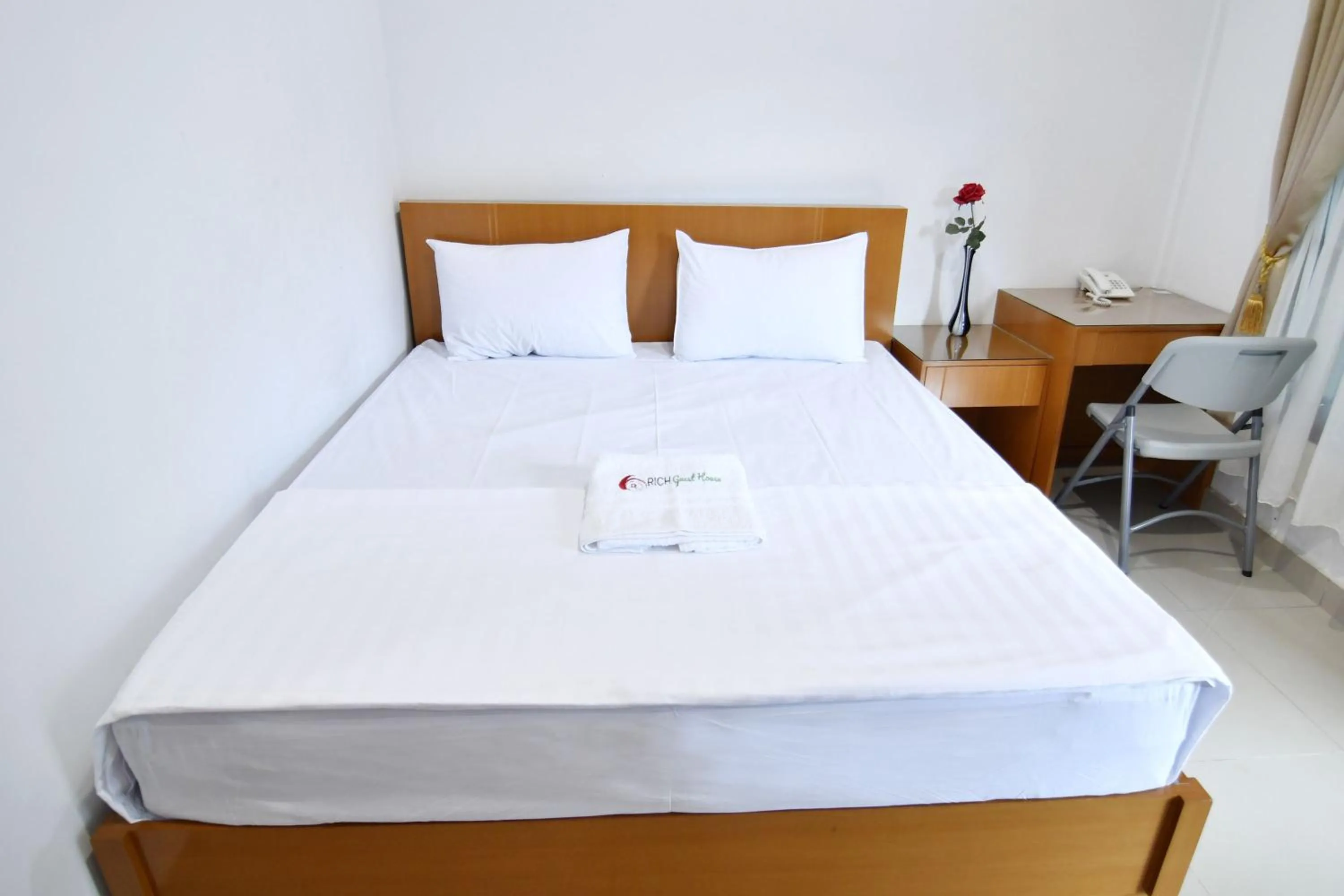 Bed in Rich Guesthouse