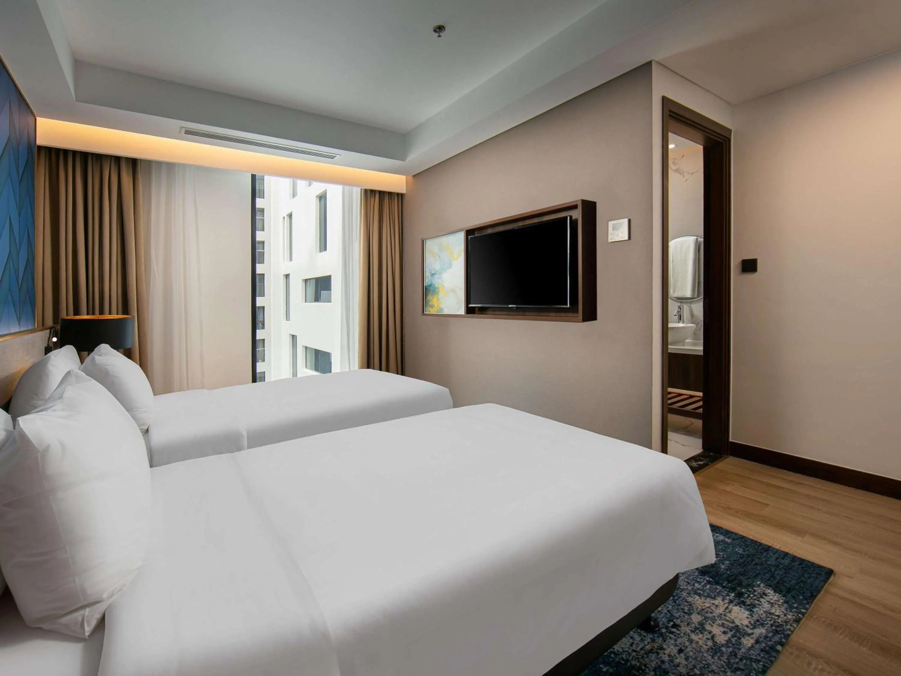 Bathroom, Bed in Eastin Hotel & Residences Hanoi