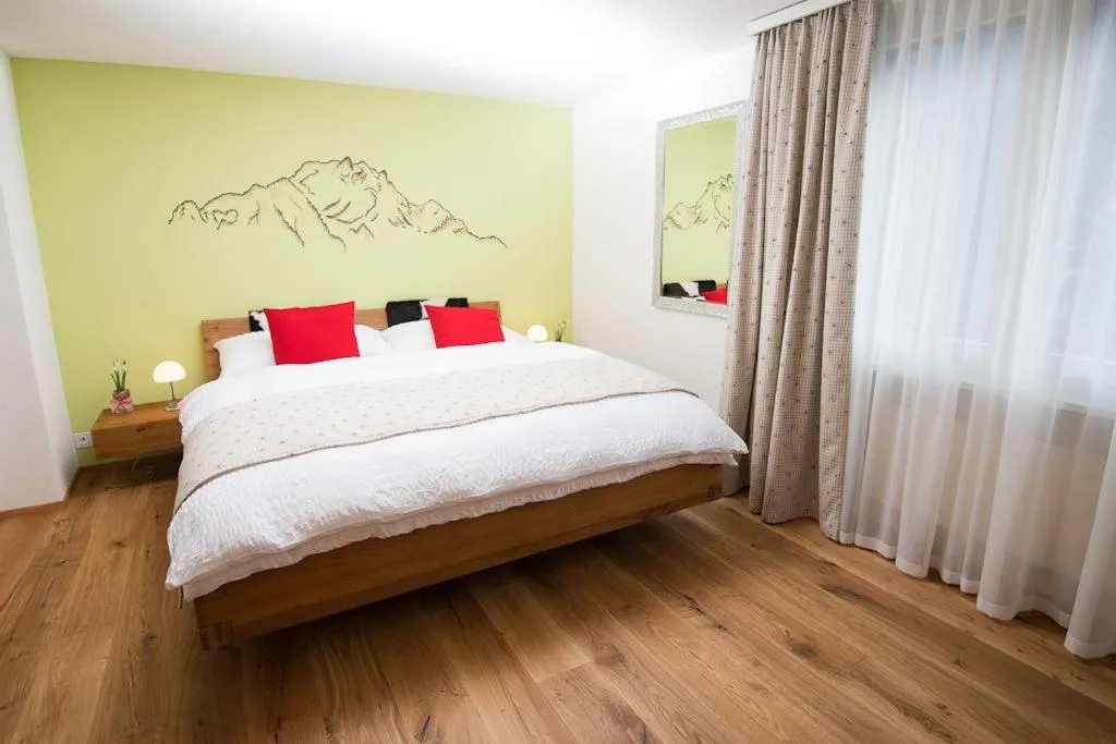 Photo of the whole room, Bed in Hotel Roggerli