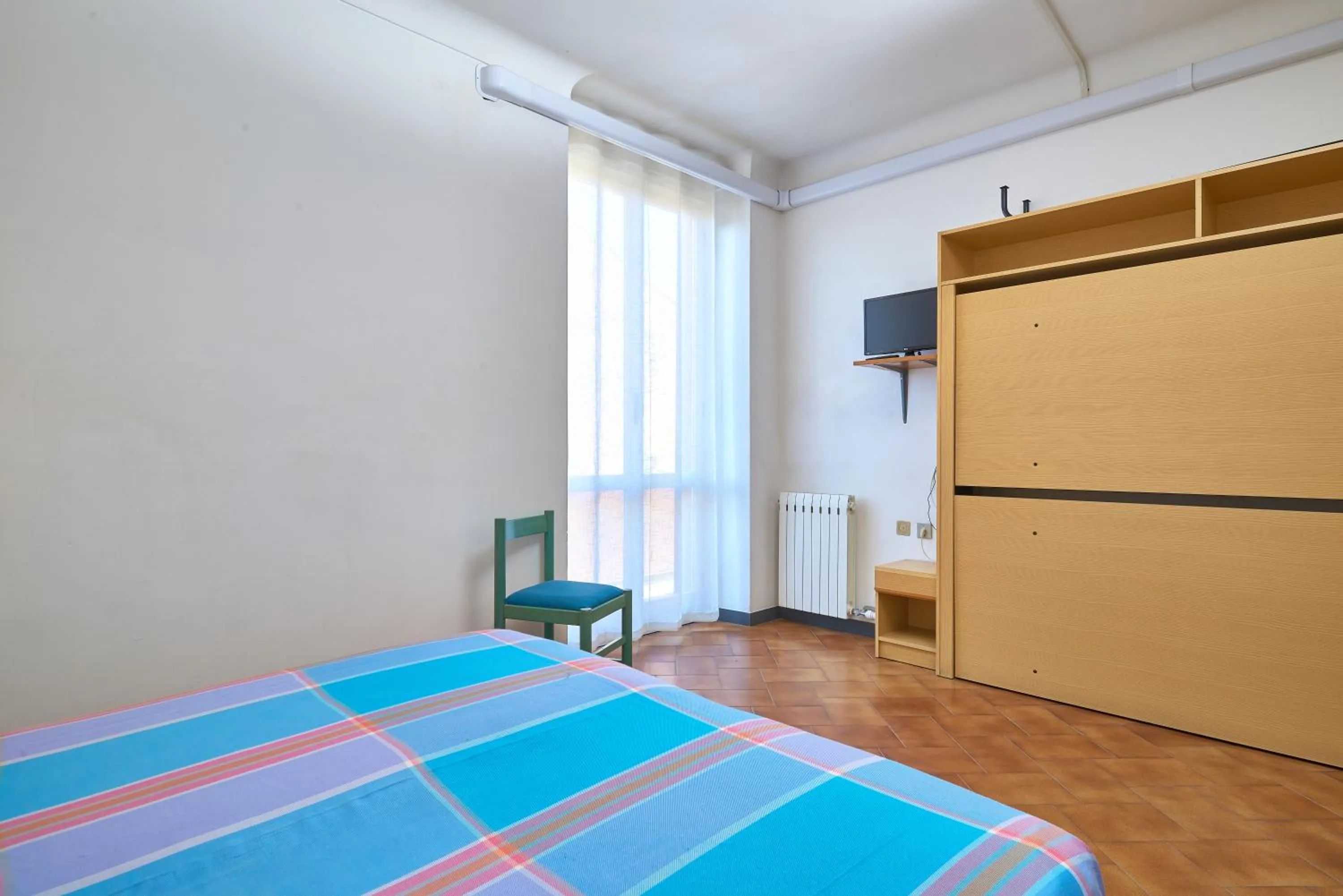 Bed in Hotel Garibaldi