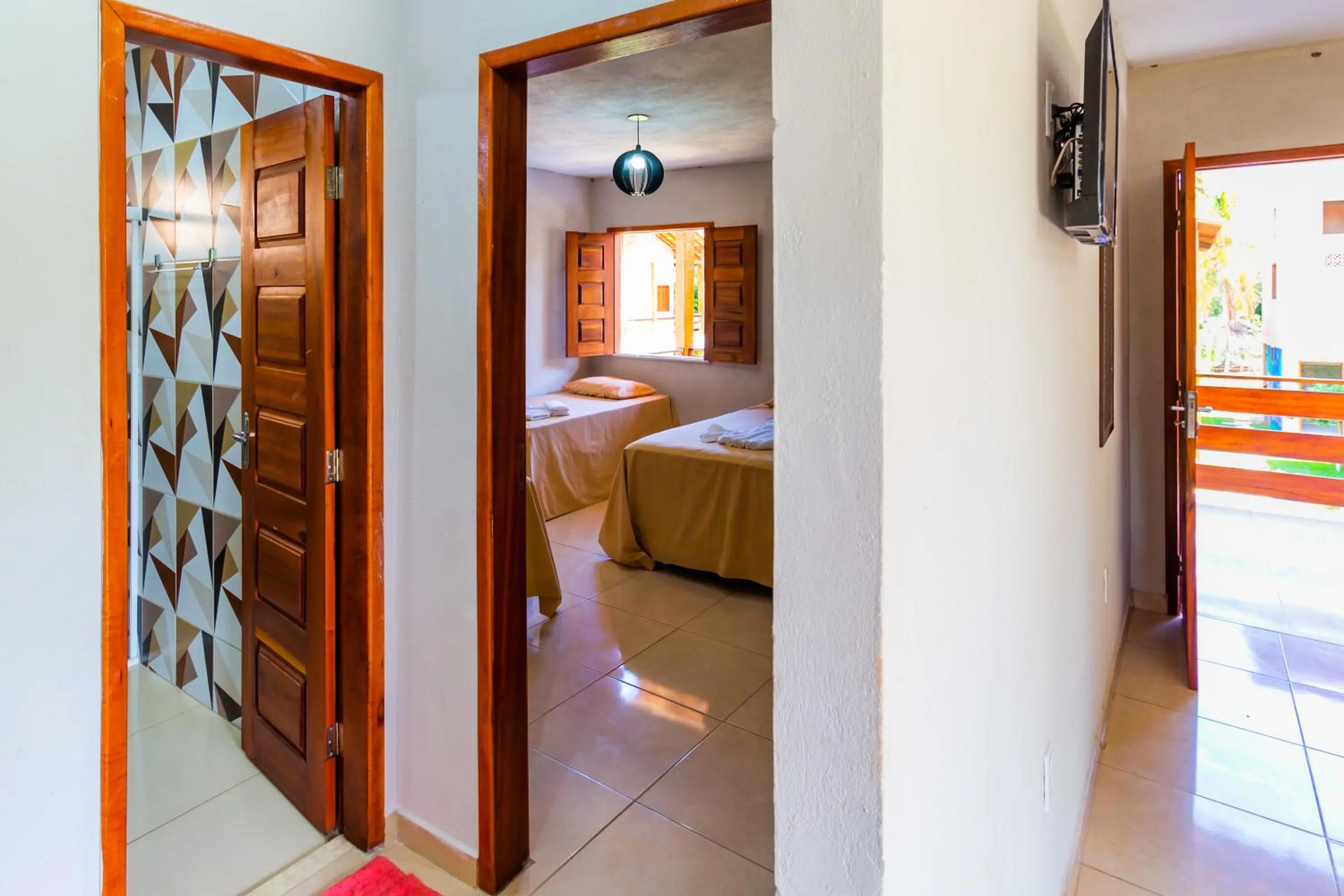 Bed in Pousada Recanto Beach