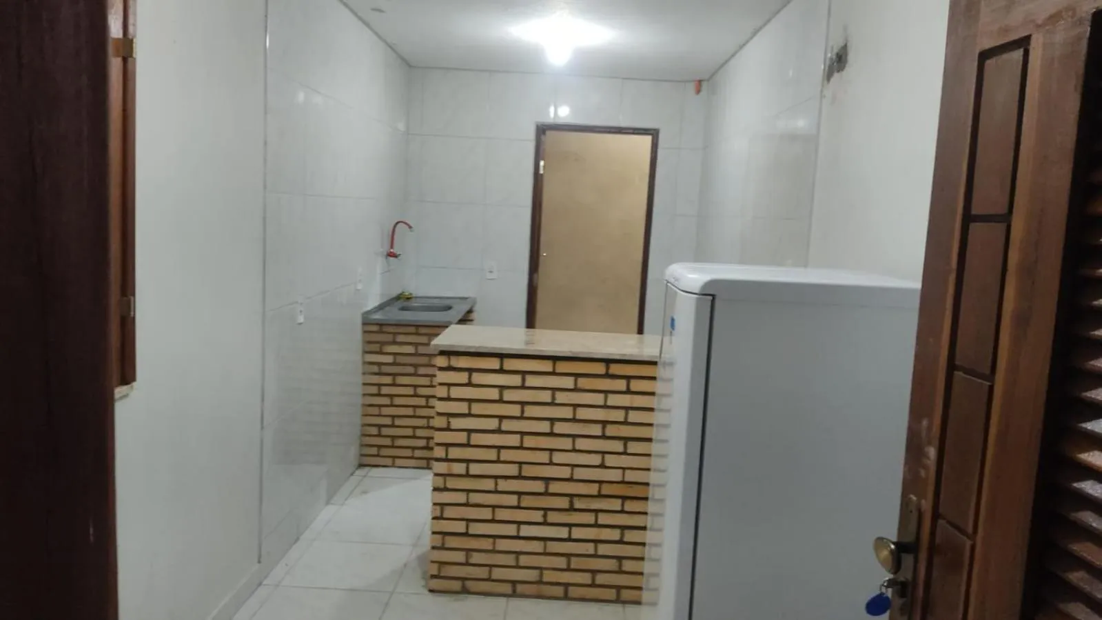 Kitchen or kitchenette in Pousada Recanto Beach