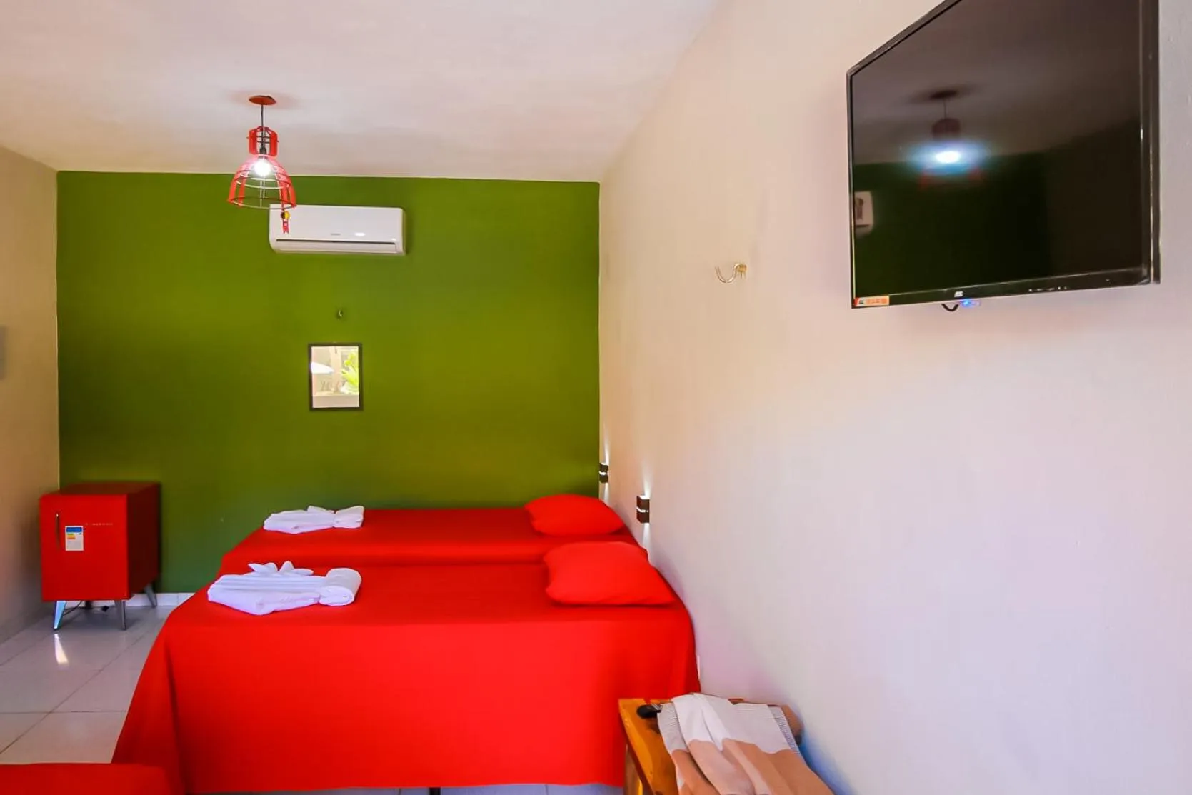 Bed in Pousada Recanto Beach